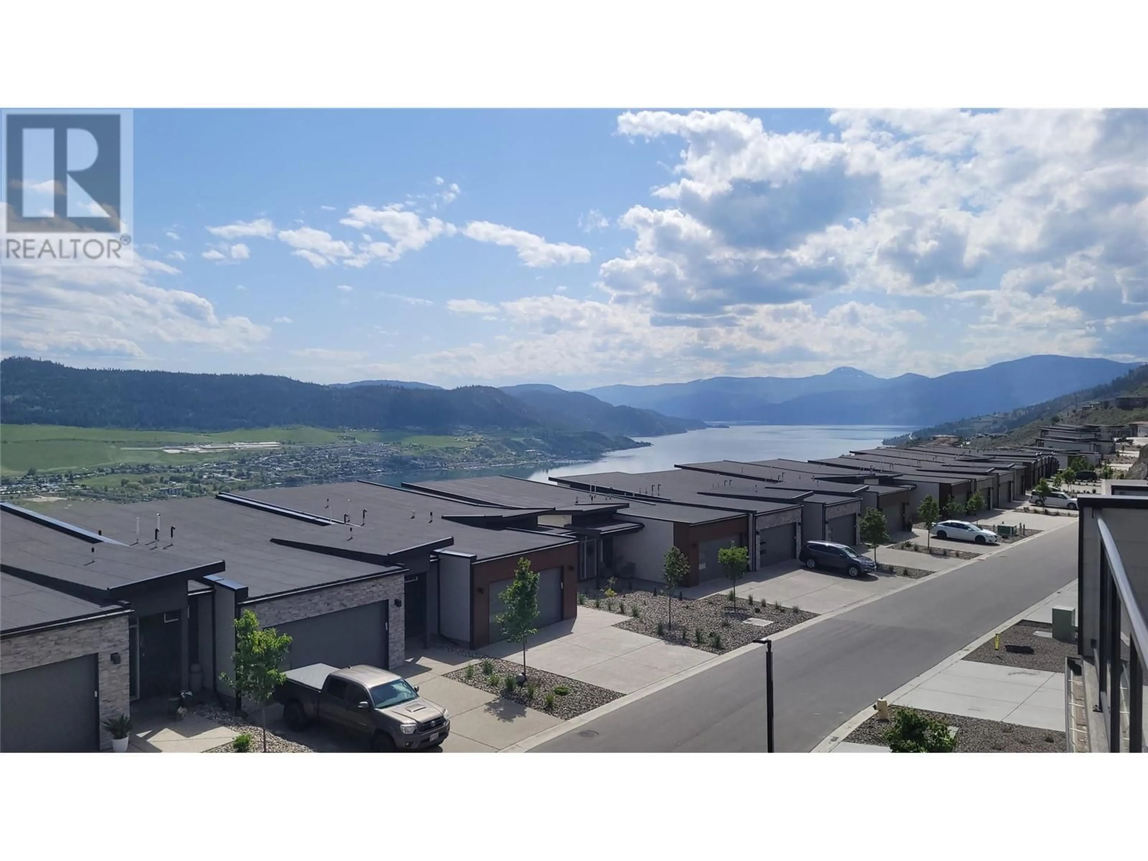 A pic from outside/outdoor area/front of a property/back of a property/a pic from drone, mountain view for 35 - 7735 OKANAGAN HILLS BOULEVARD, Vernon British Columbia V1H0A7