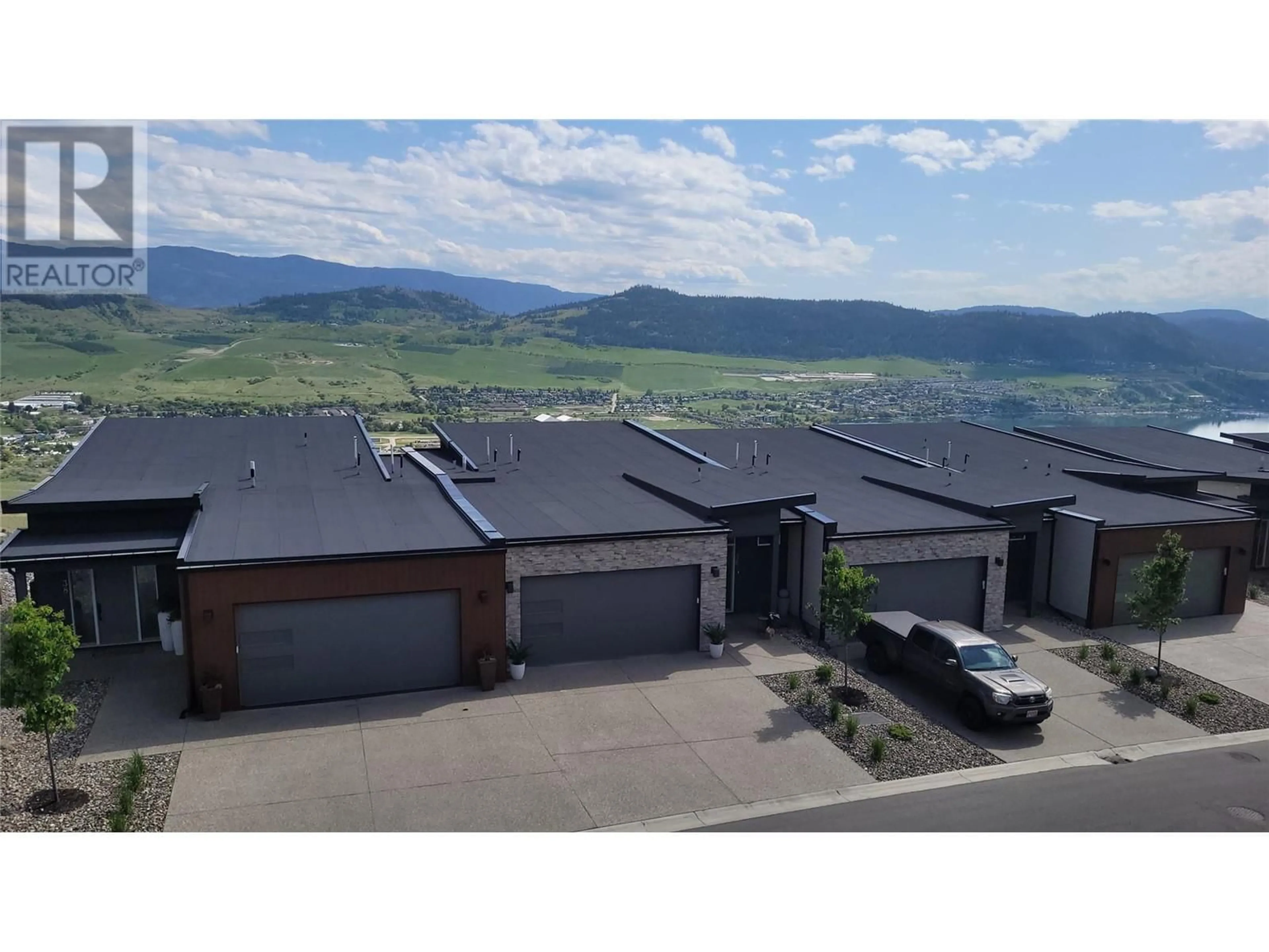 A pic from outside/outdoor area/front of a property/back of a property/a pic from drone, mountain view for 35 - 7735 OKANAGAN HILLS BOULEVARD, Vernon British Columbia V1H0A7