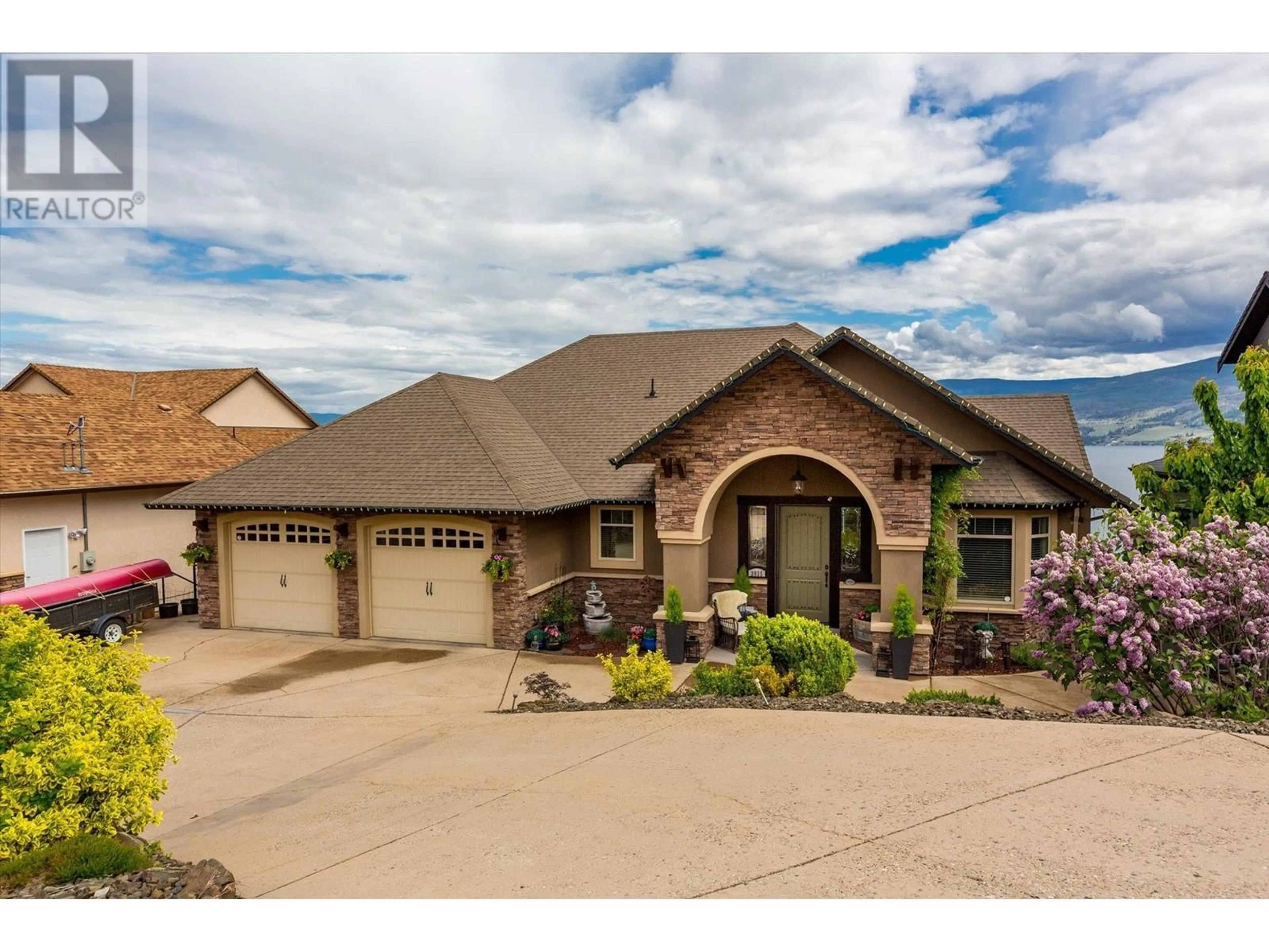 Home with brick exterior material, street for 3935 HARDING ROAD, West Kelowna British Columbia V4T2J9