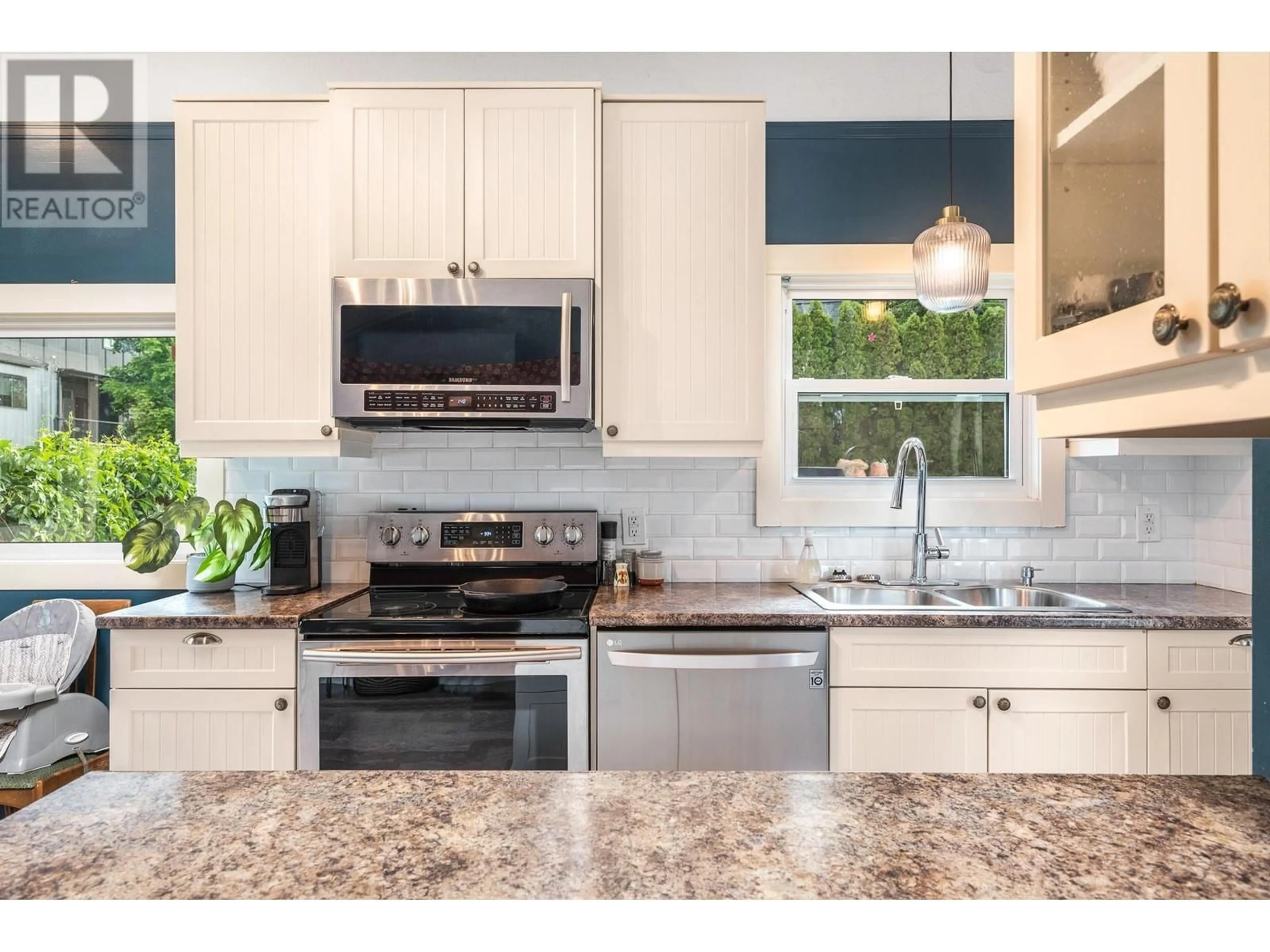 Open concept kitchen, ceramic/tile floor for 2501 35 AVENUE, Vernon British Columbia V1T2S6