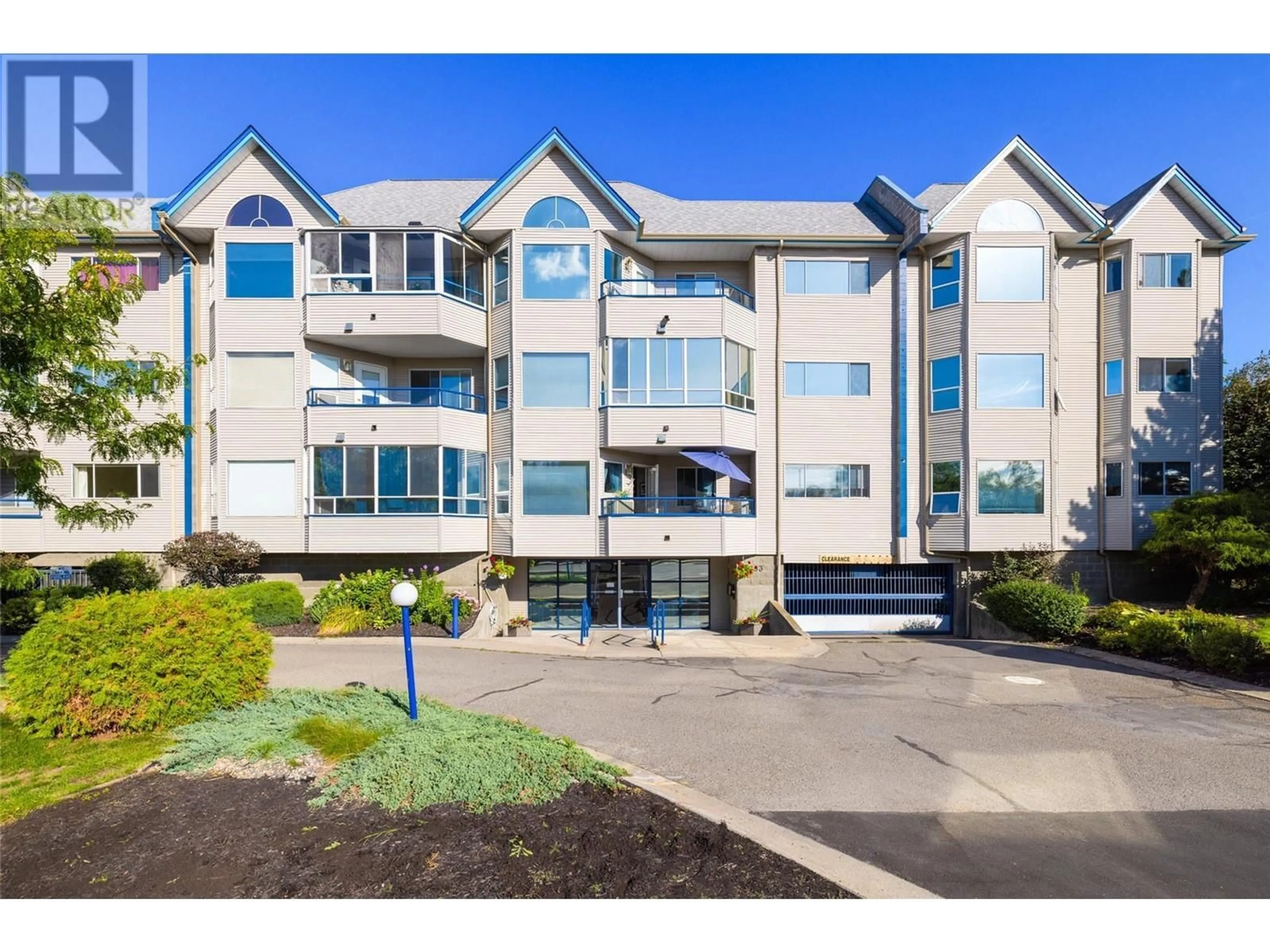 A pic from outside/outdoor area/front of a property/back of a property/a pic from drone, building for 202 - 3283 CASORSO ROAD, Kelowna British Columbia V1W3L6