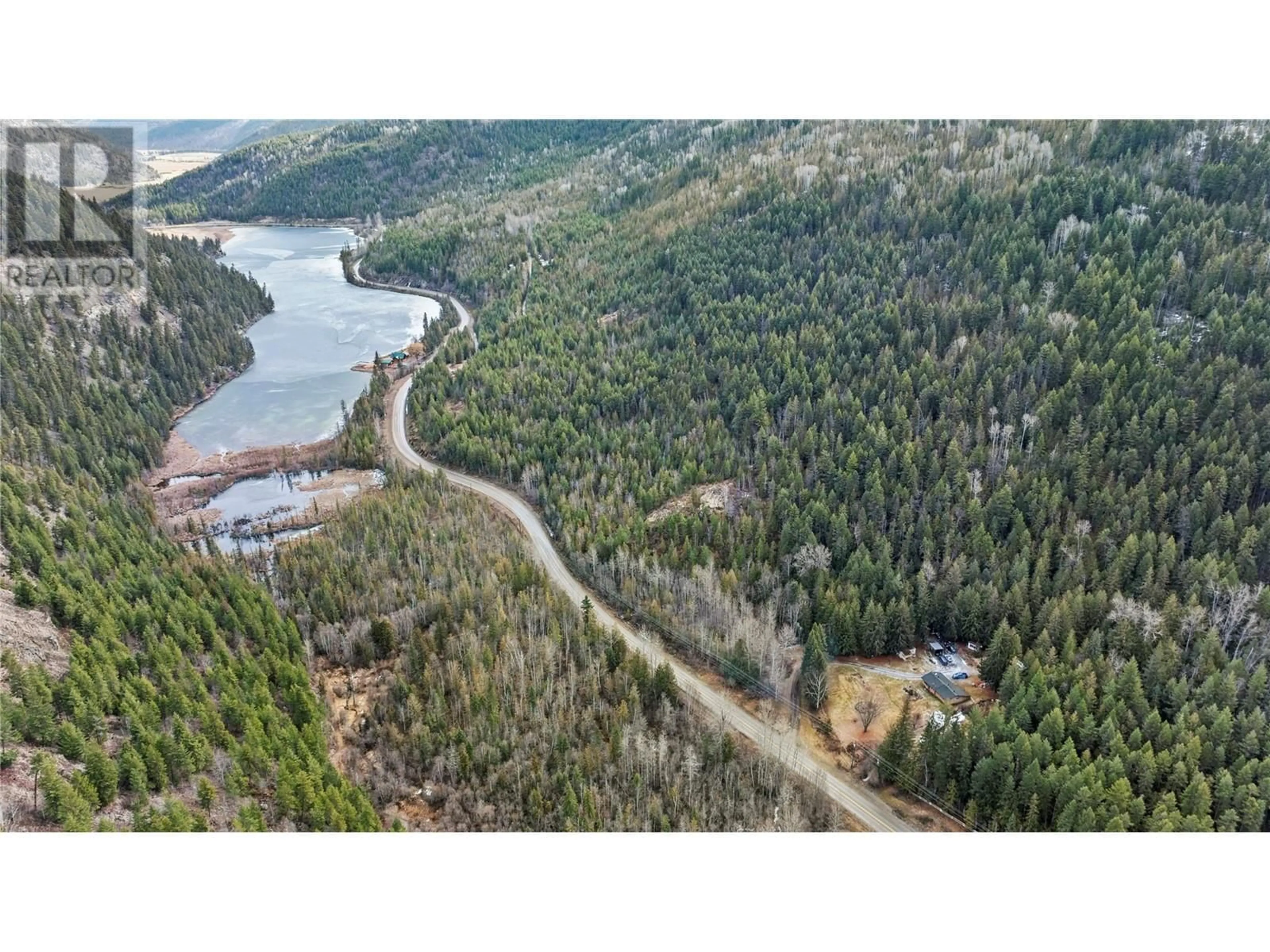 A pic from outside/outdoor area/front of a property/back of a property/a pic from drone, water/lake/river/ocean view for 2055 AGATE BAY ROAD, Barriere British Columbia V0E2E0
