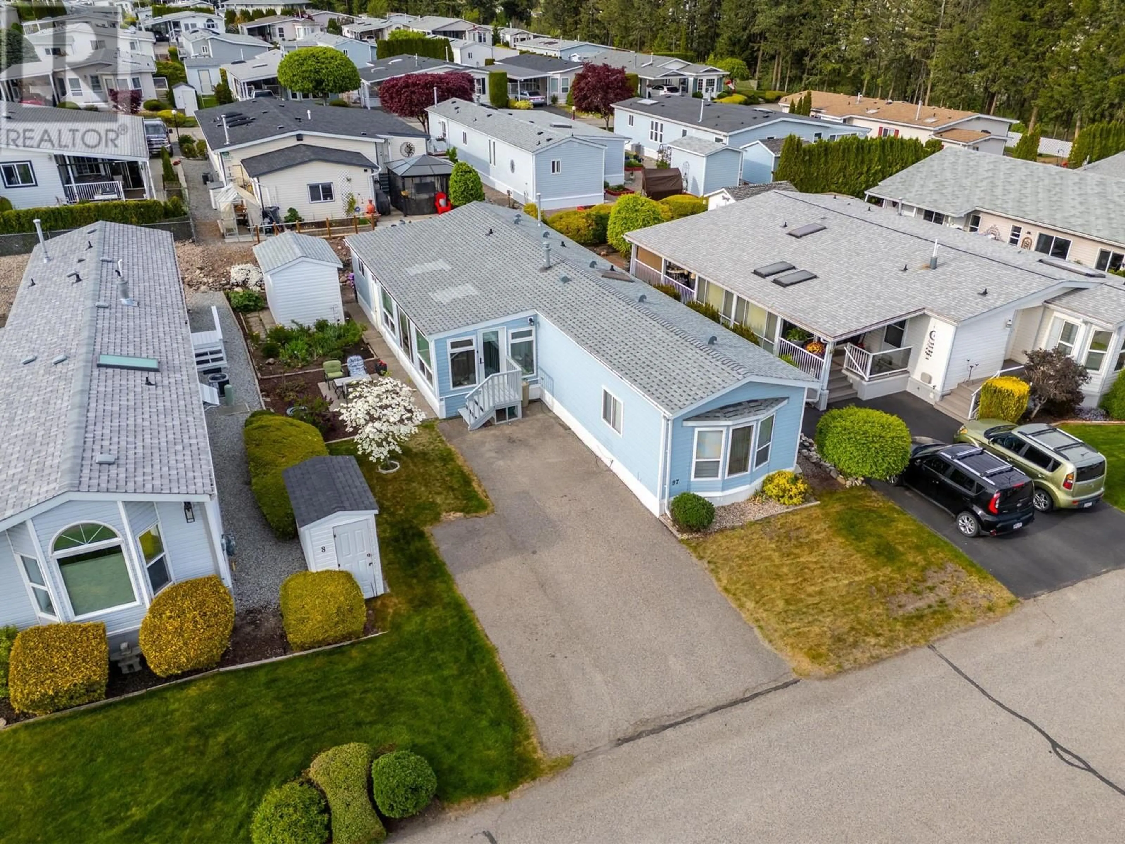 A pic from outside/outdoor area/front of a property/back of a property/a pic from drone, street for #97 1850 SHANNON LAKE ROAD, Kelowna British Columbia V4T1L6