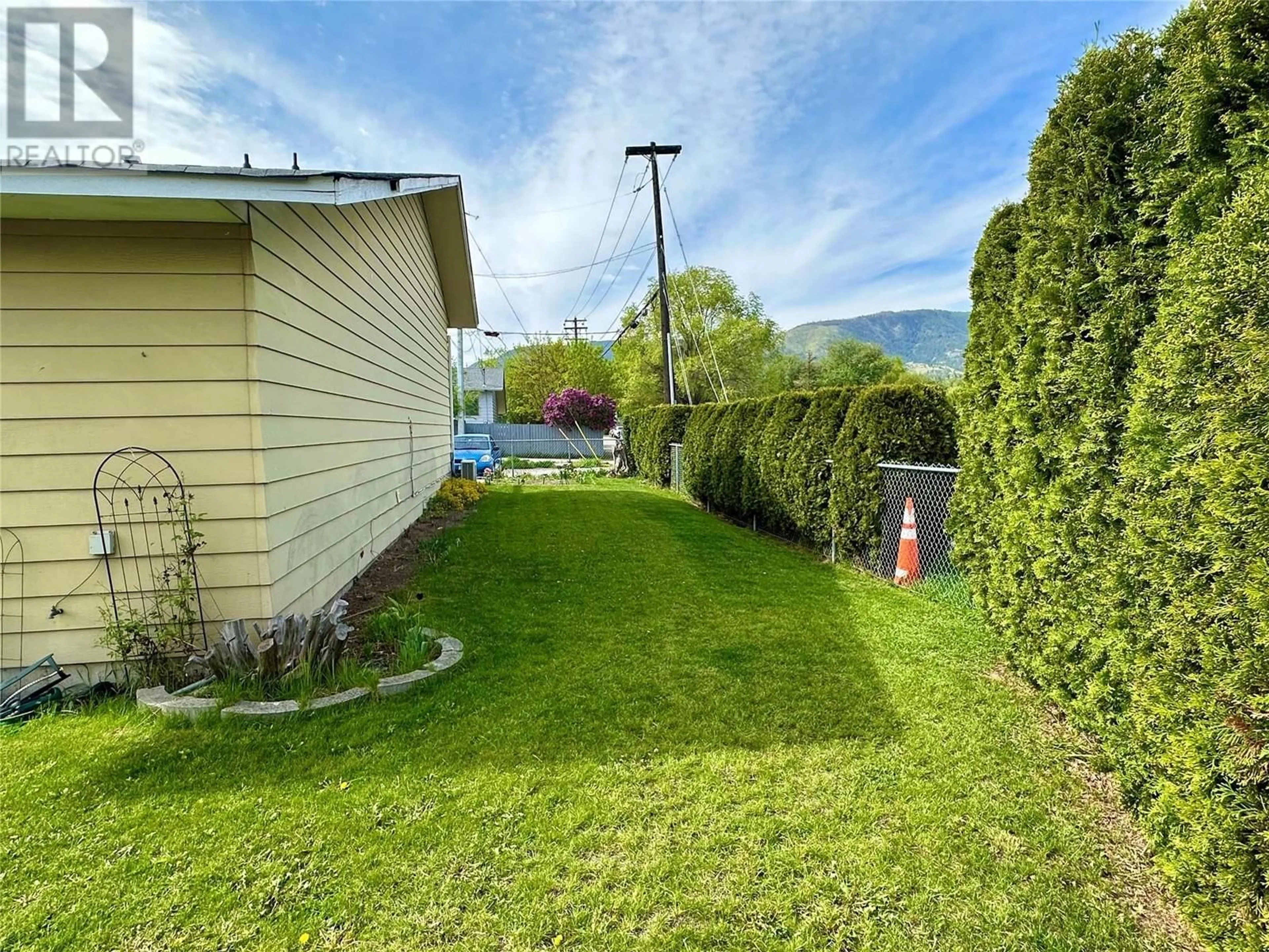 A pic from outside/outdoor area/front of a property/back of a property/a pic from drone, mountain view for 798 ECKHARDT AVENUE WEST, Penticton British Columbia V2A2B7