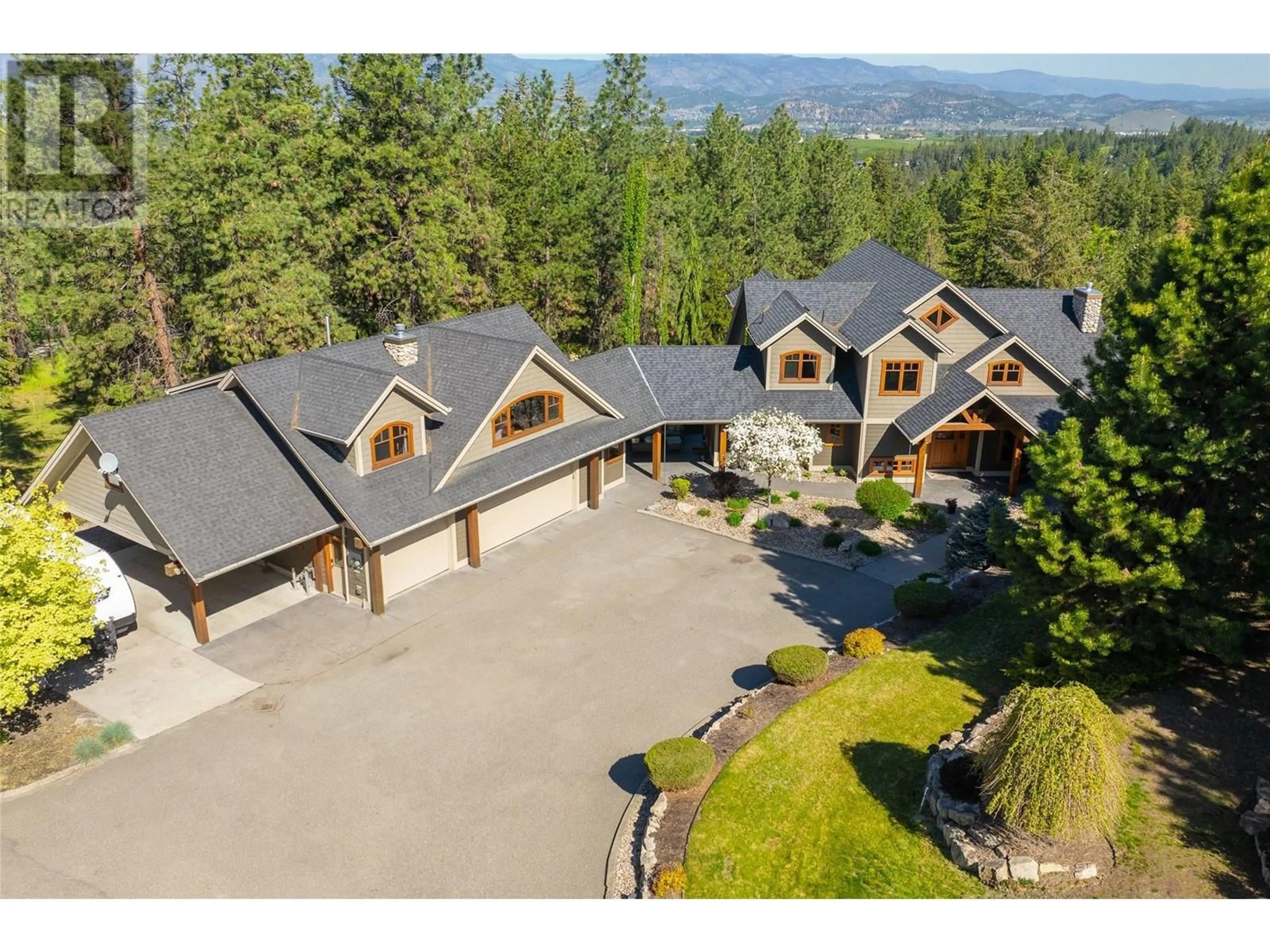 A pic from outside/outdoor area/front of a property/back of a property/a pic from drone, mountain view for 4150 SEDDON ROAD, Kelowna British Columbia V1W4C9