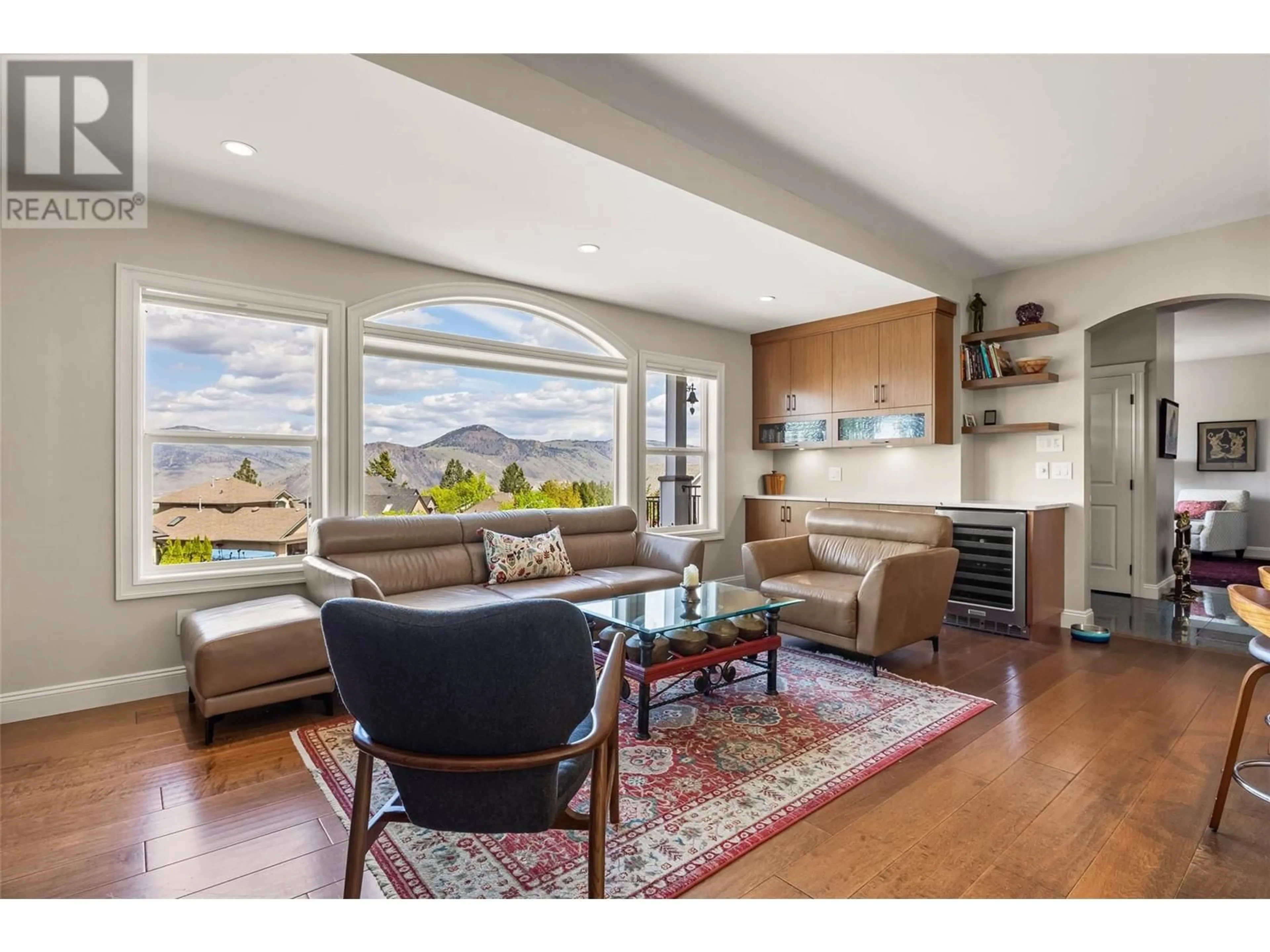 Living room with furniture, wood/laminate floor for 432 AZURE PLACE, Kamloops British Columbia V2E2R2