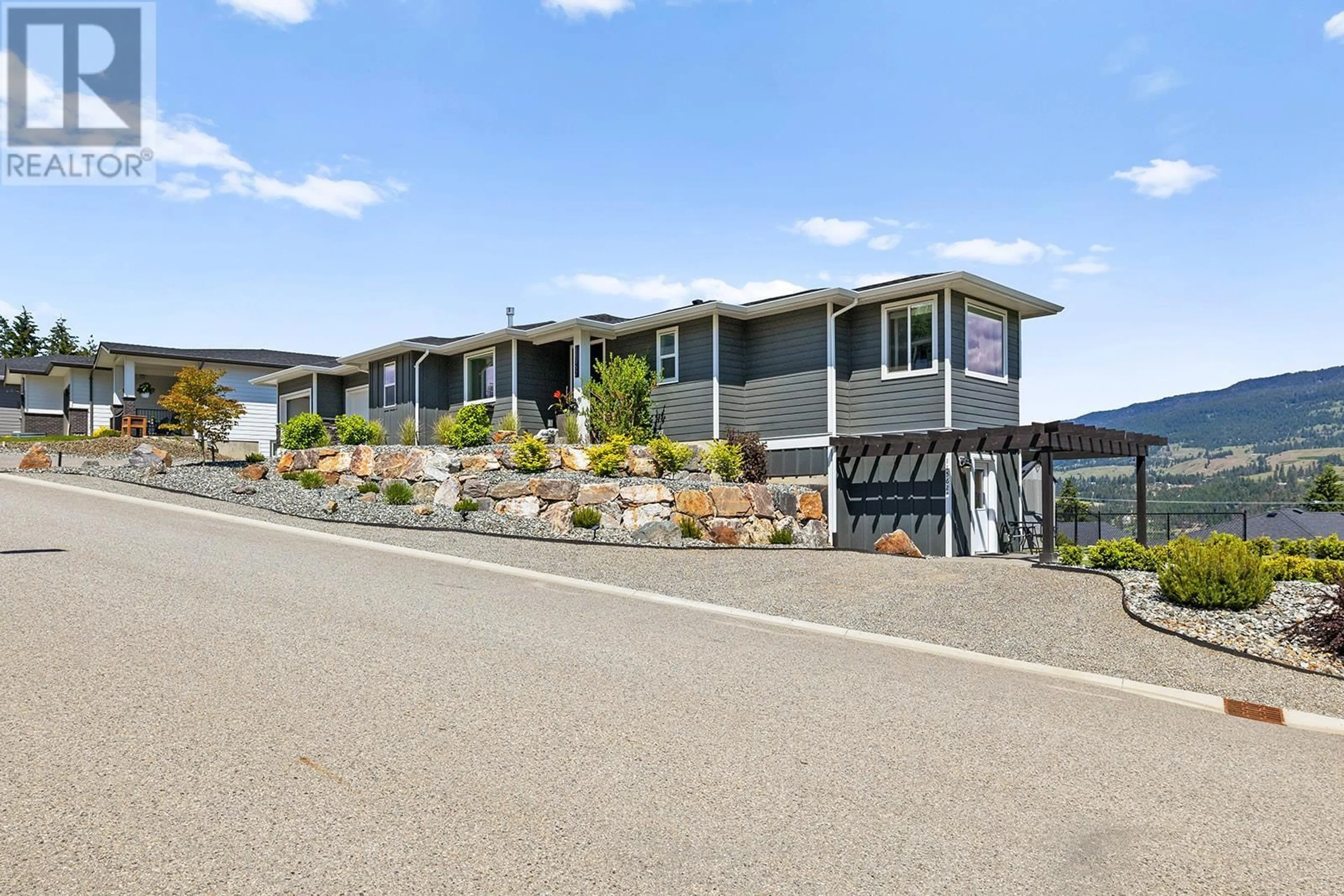 A pic from outside/outdoor area/front of a property/back of a property/a pic from drone, mountain view for 11562 MIDDLETON ROAD SOUTH, Lake Country British Columbia V4V1G6