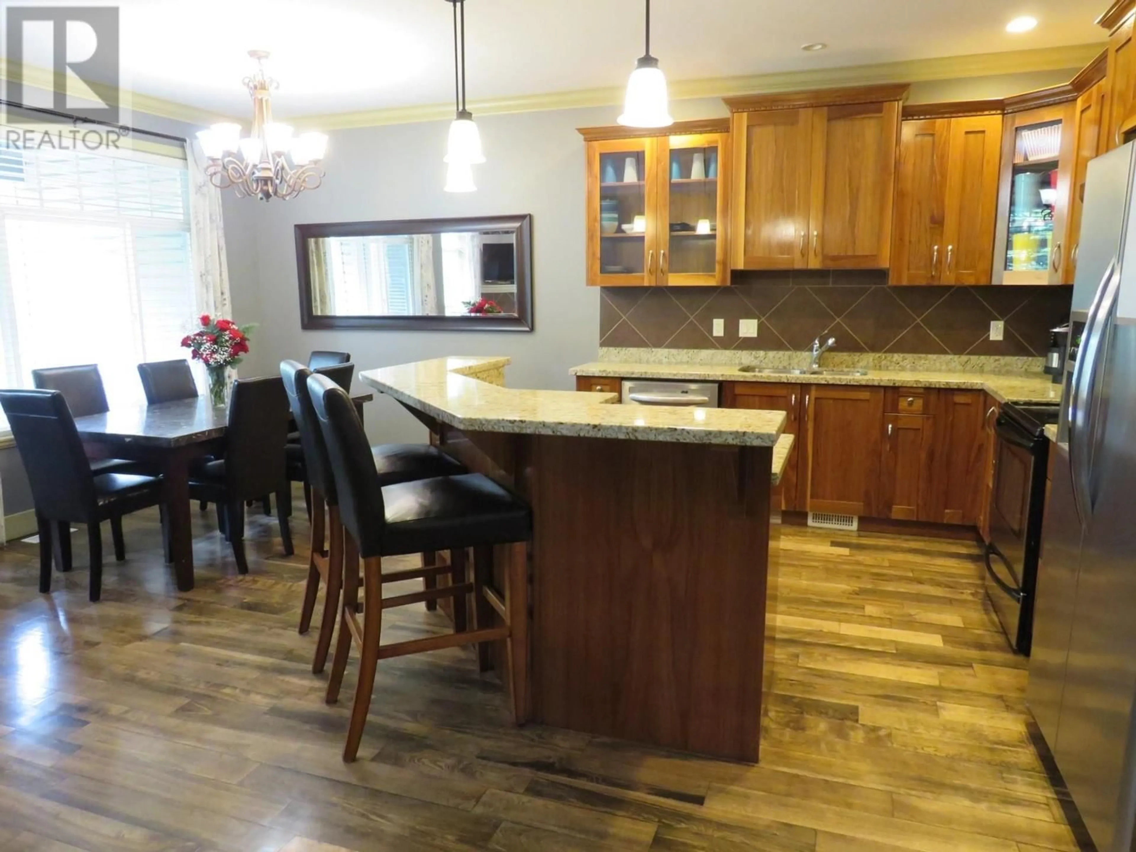Open concept kitchen, wood/laminate floor for 1 - 2046 ROBSON PLACE, Kamloops British Columbia V2E0A5