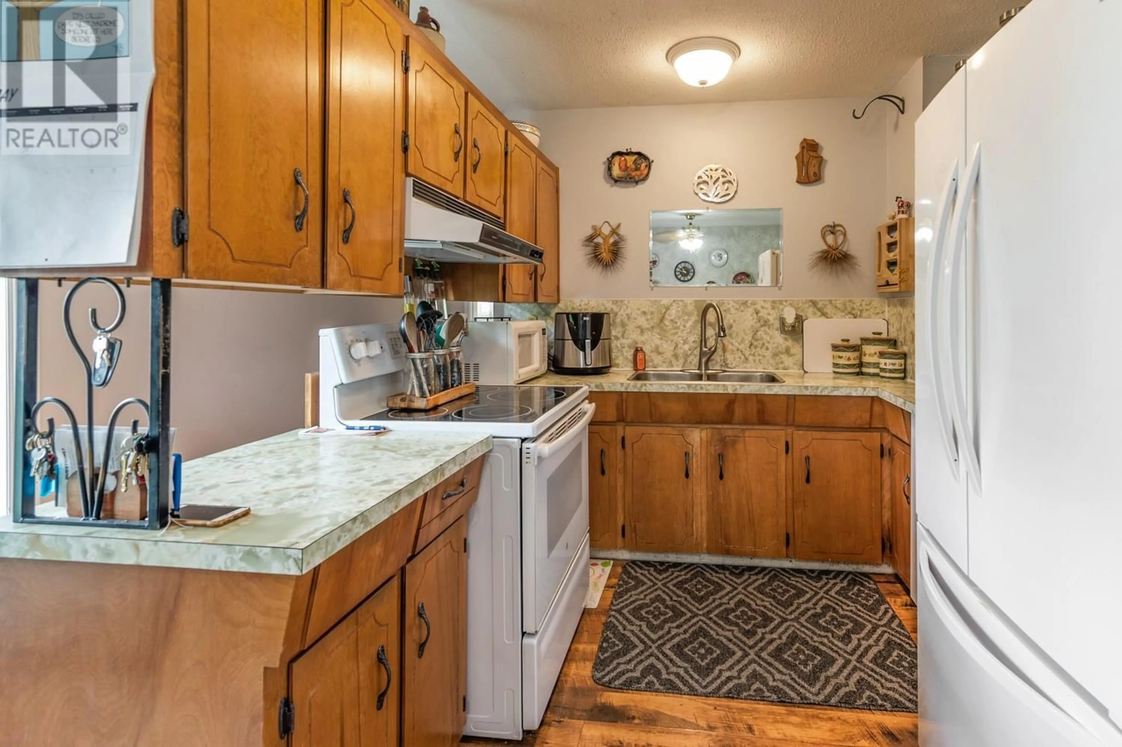 Standard kitchen, ceramic/tile floor for 11179 DELDOR ROAD, Lake Country British Columbia V4V1V8
