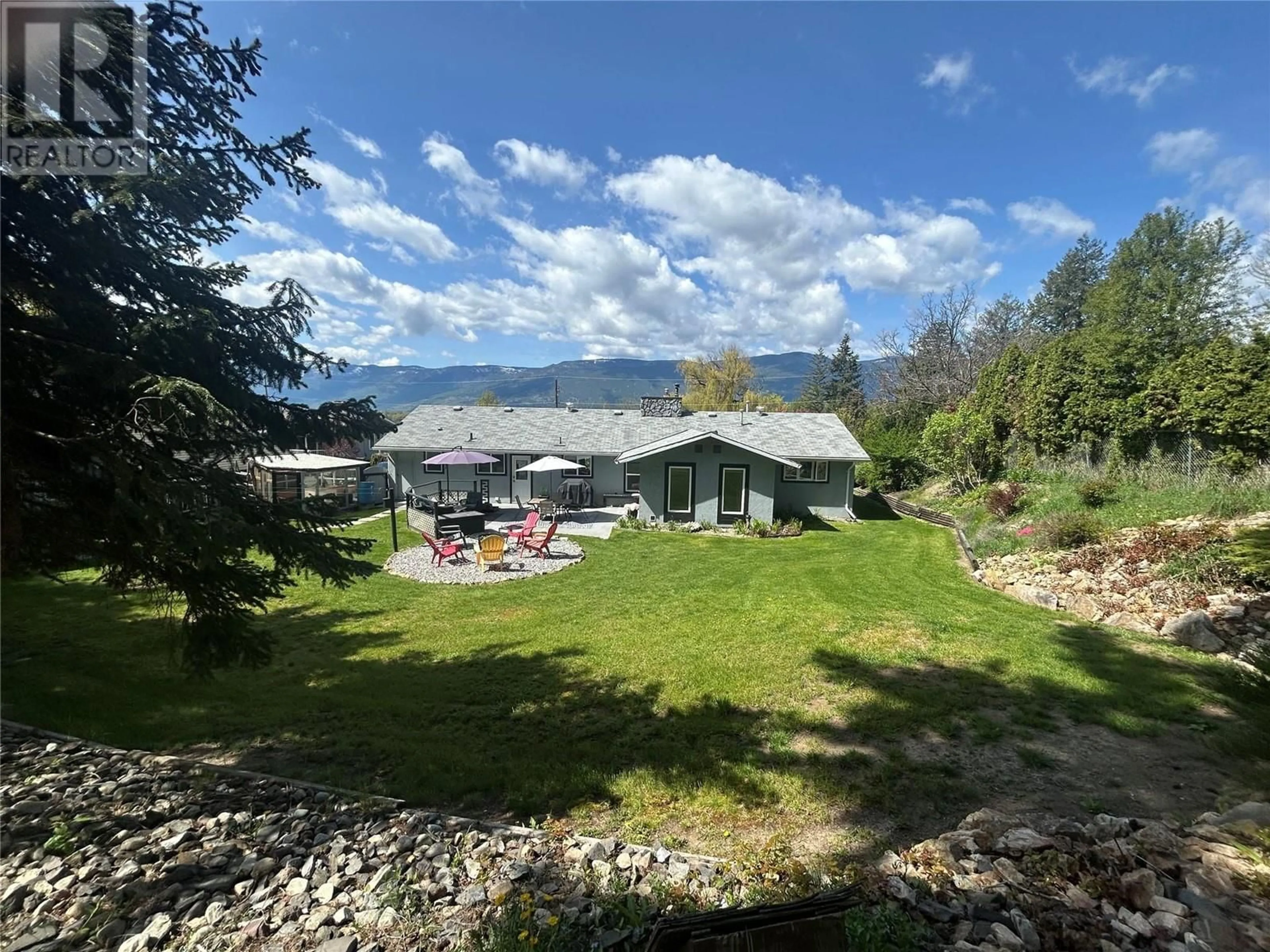 A pic from outside/outdoor area/front of a property/back of a property/a pic from drone, water/lake/river/ocean view for 1850 LAKESHORE ROAD, Salmon Arm British Columbia V1E3X7