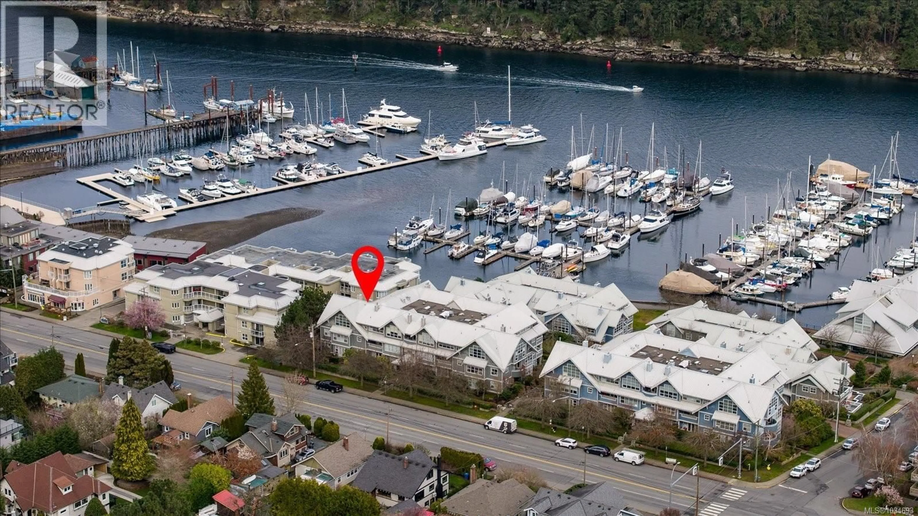 A pic from outside/outdoor area/front of a property/back of a property/a pic from drone, water/lake/river/ocean view for 703 - 540 STEWART AVENUE, Nanaimo British Columbia V9S5T5