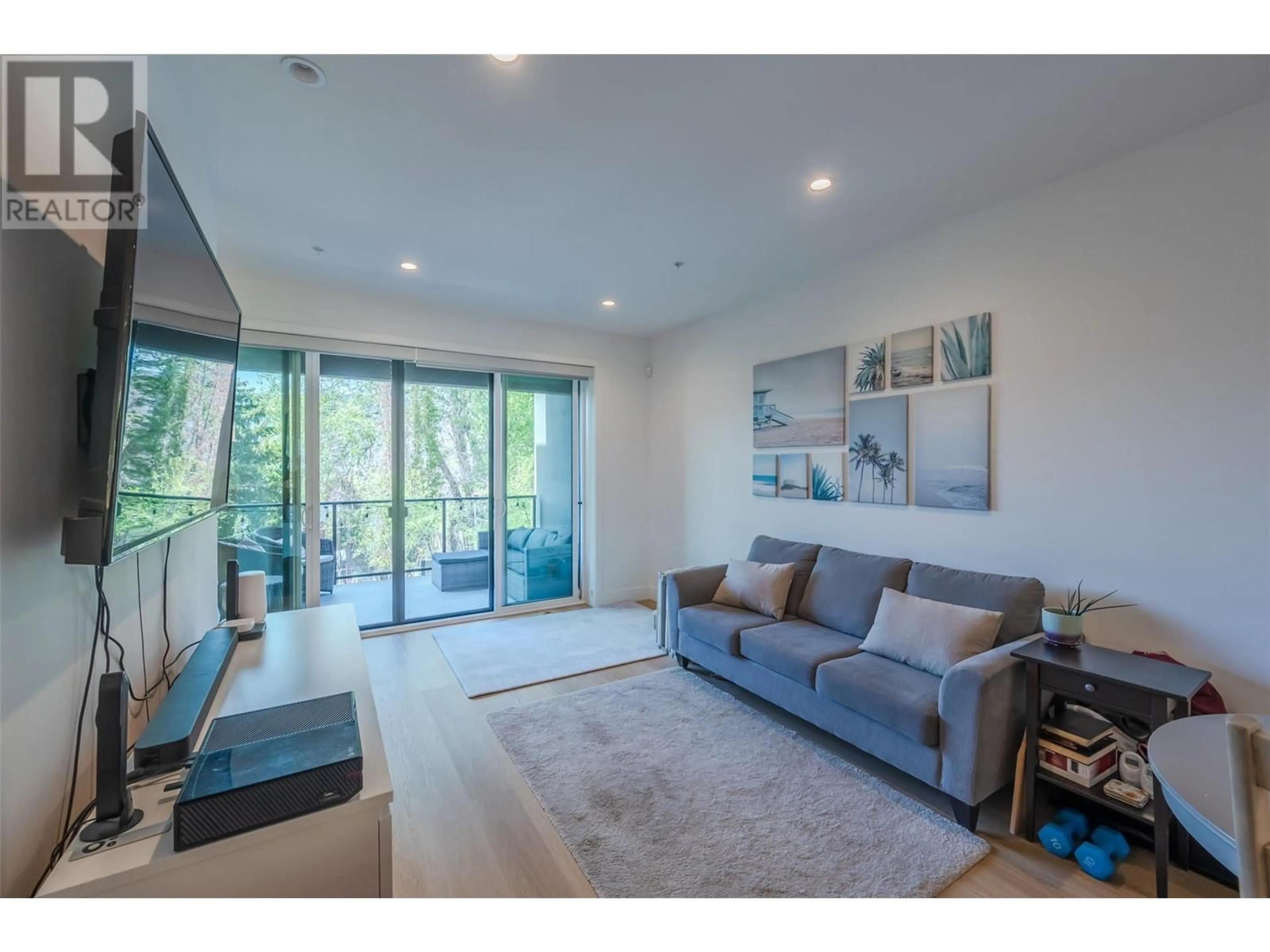 Living room with furniture, unknown for 107 - 555 WADE AVENUE EAST, Penticton British Columbia V2A1T3