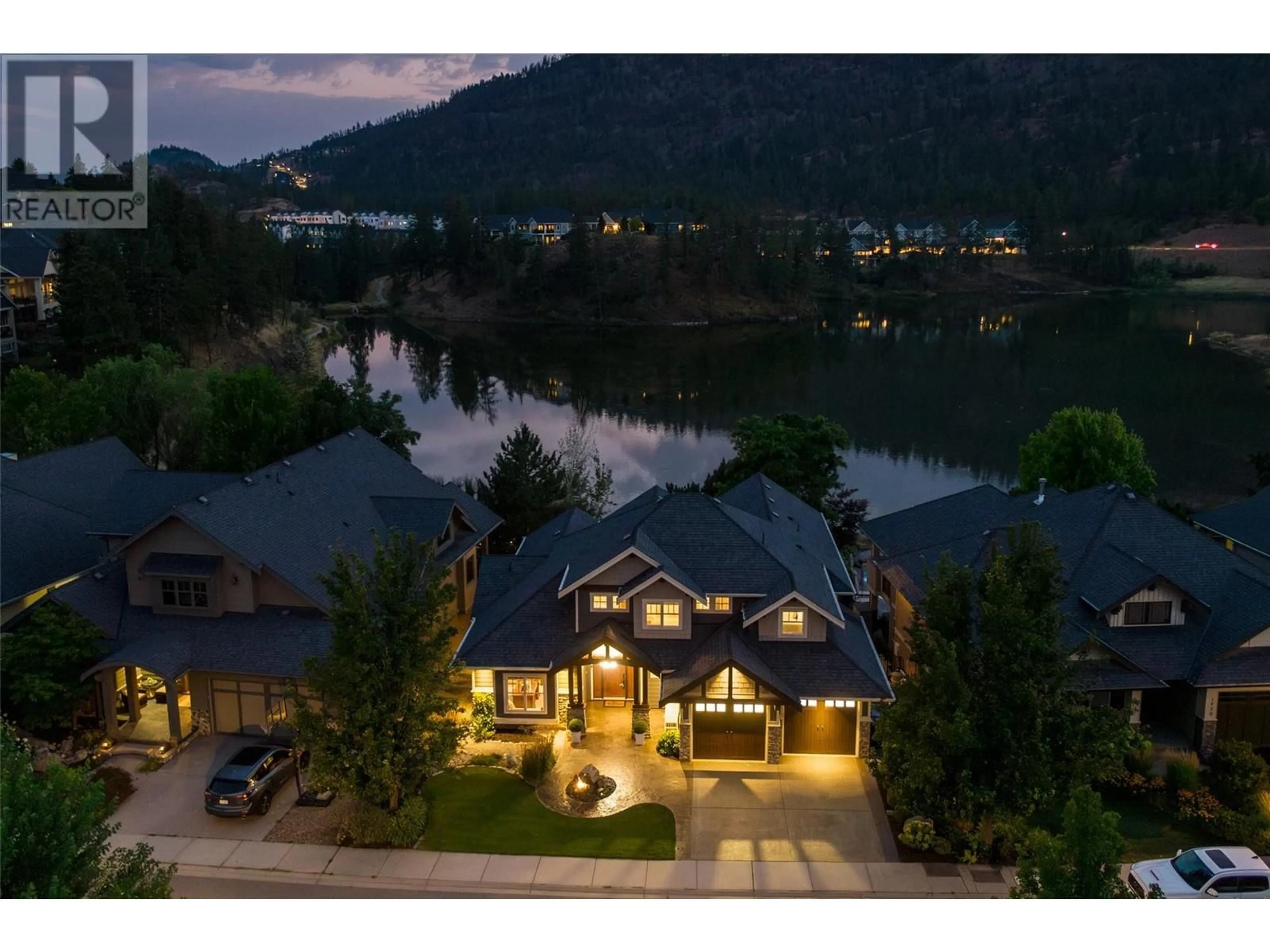 A pic from outside/outdoor area/front of a property/back of a property/a pic from drone, water/lake/river/ocean view for 1958 HIDDEN LAKE PLACE, Kelowna British Columbia V1V2W8