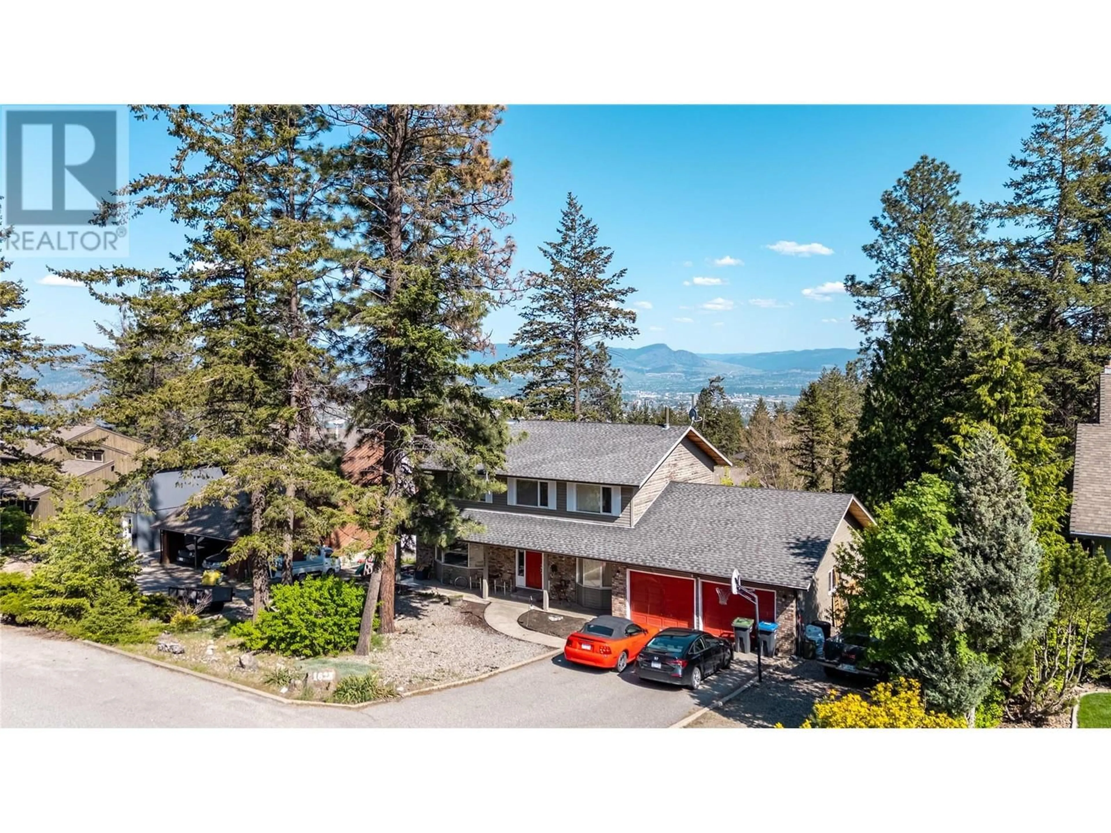 A pic from outside/outdoor area/front of a property/back of a property/a pic from drone, mountain view for 1623 BLACKWOOD DRIVE, West Kelowna British Columbia V1Z3B7
