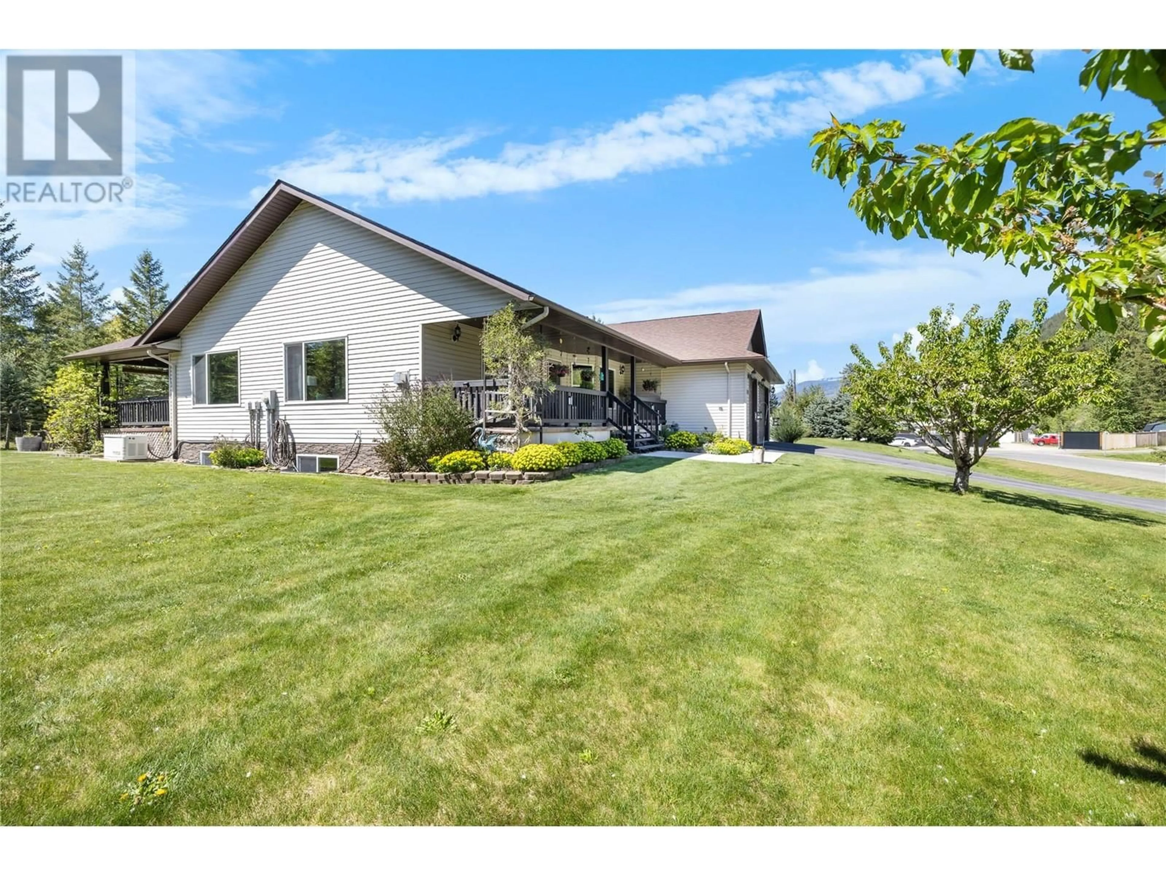 A pic from outside/outdoor area/front of a property/back of a property/a pic from drone, mountain view for 1333 8TH AVENUE NORTH, Creston British Columbia V0B1G6