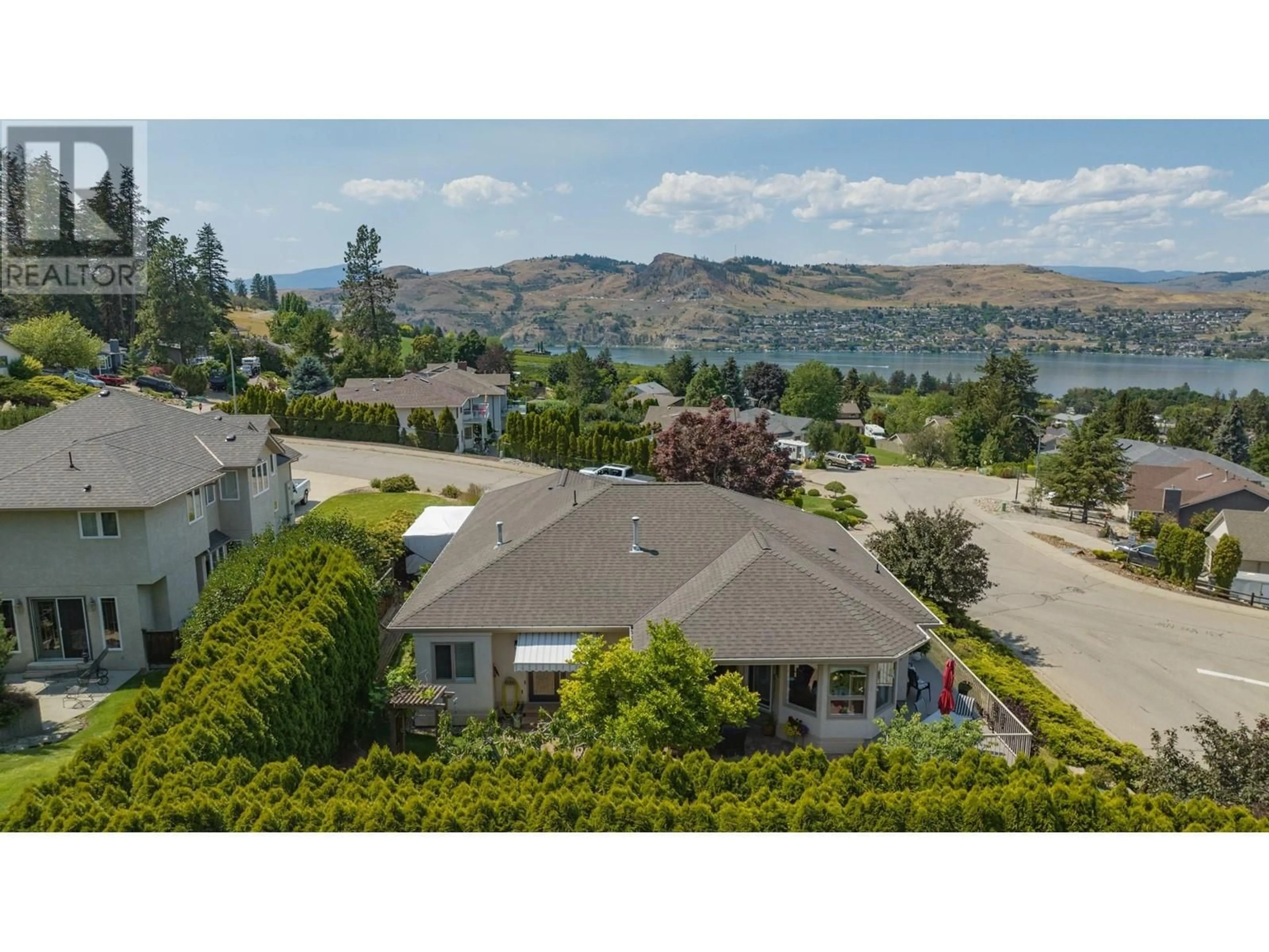 A pic from outside/outdoor area/front of a property/back of a property/a pic from drone, water/lake/river/ocean view for 11424 PALFREY DRIVE EAST OTHER, Coldstream British Columbia V1B2B1