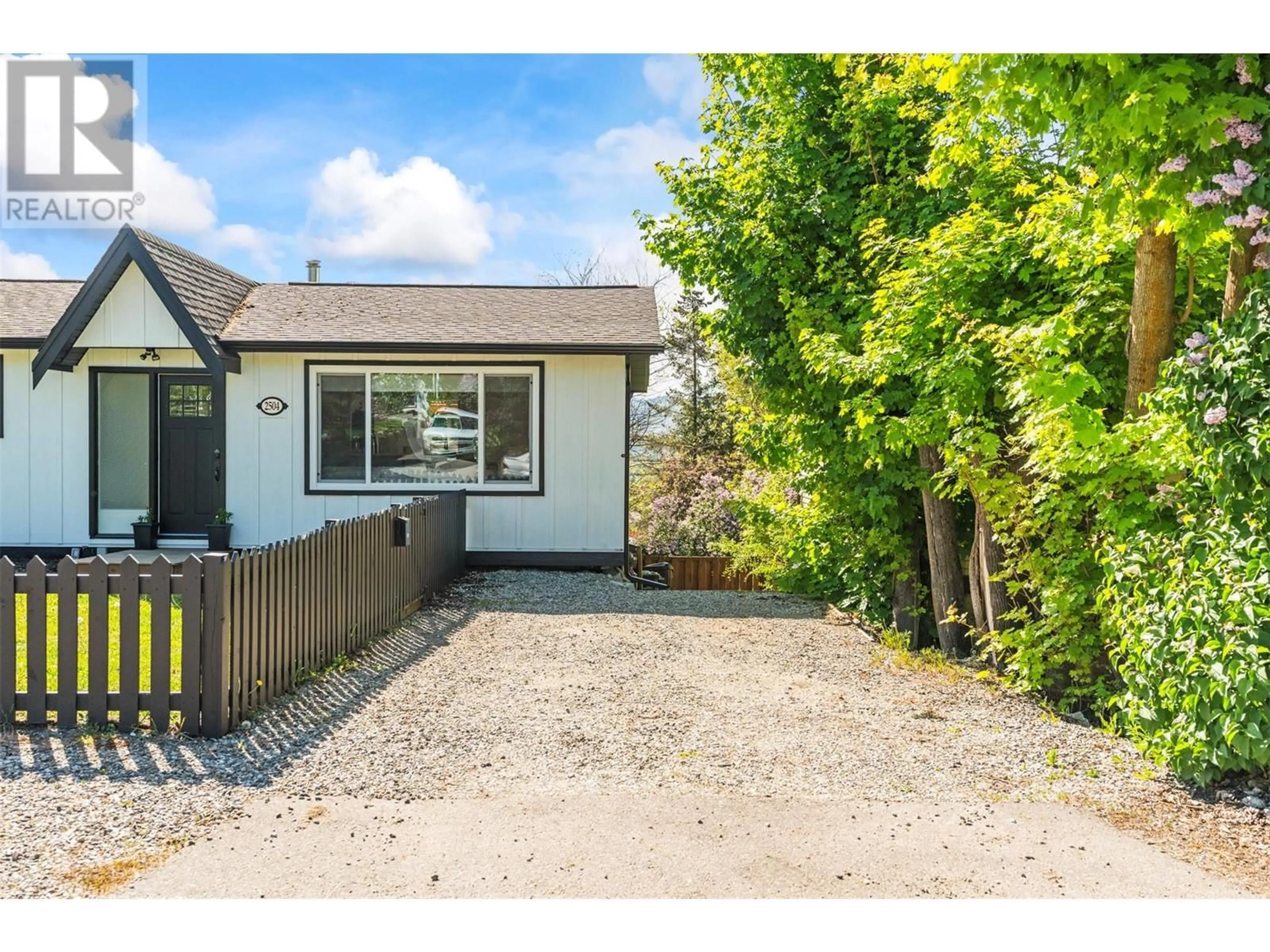 A pic from outside/outdoor area/front of a property/back of a property/a pic from drone, street for 2504 26 STREET, Vernon British Columbia V1T4T5