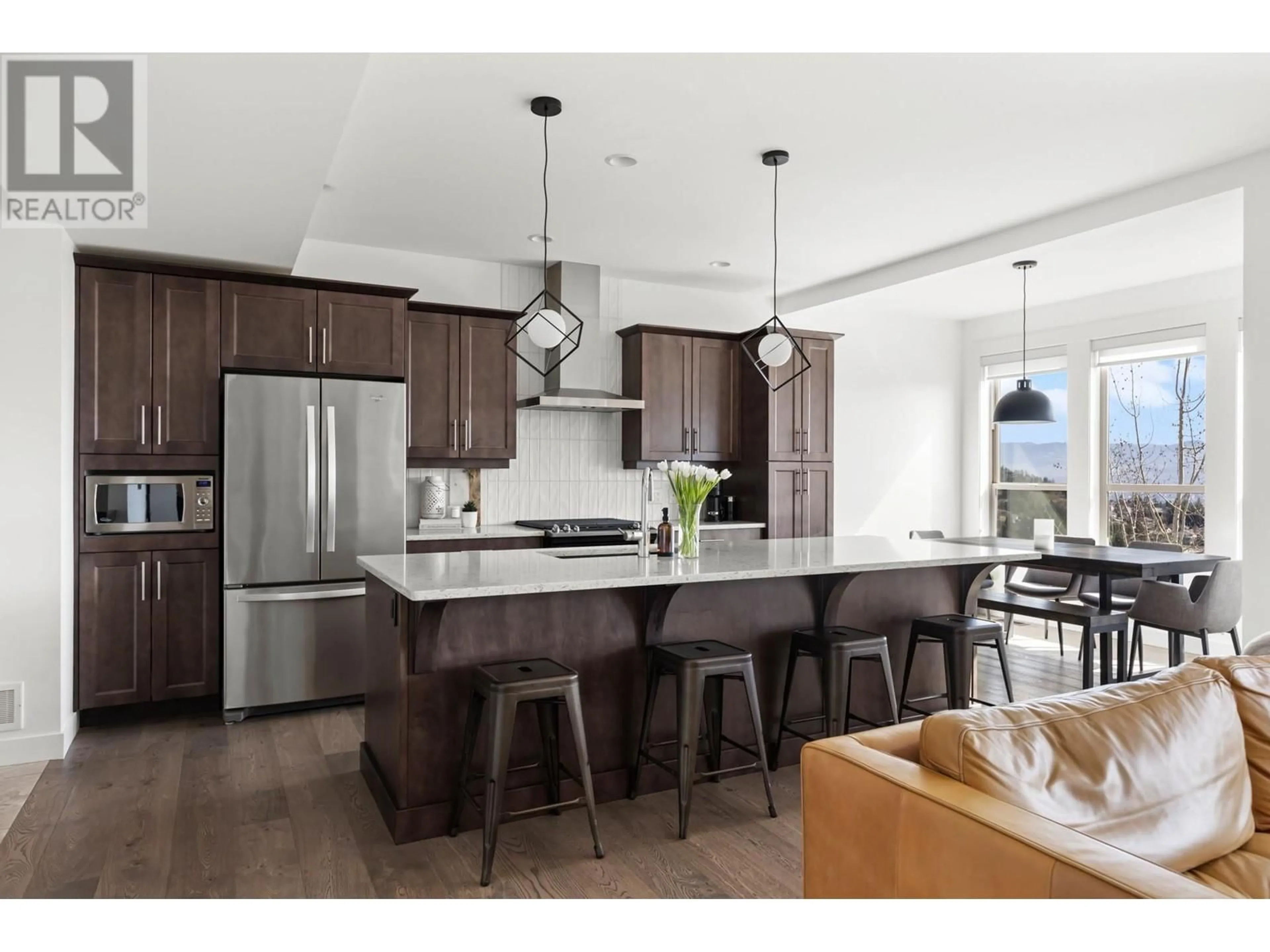 Open concept kitchen, wood/laminate floor for 29 - 1870 ROSEALEE LANE, West Kelowna British Columbia V1Z4E2