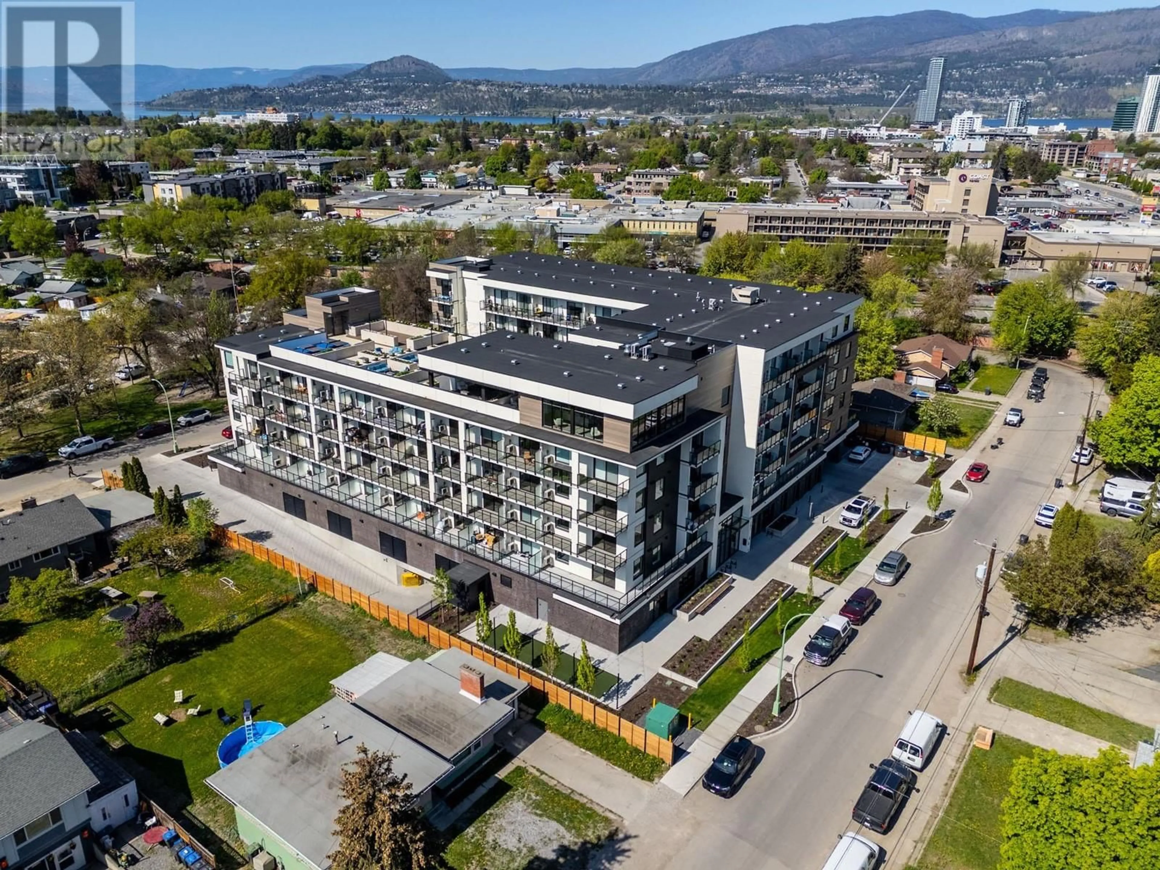 A pic from outside/outdoor area/front of a property/back of a property/a pic from drone, unknown for 614 - 1301 BELAIRE AVENUE, Kelowna British Columbia V1Y6B8