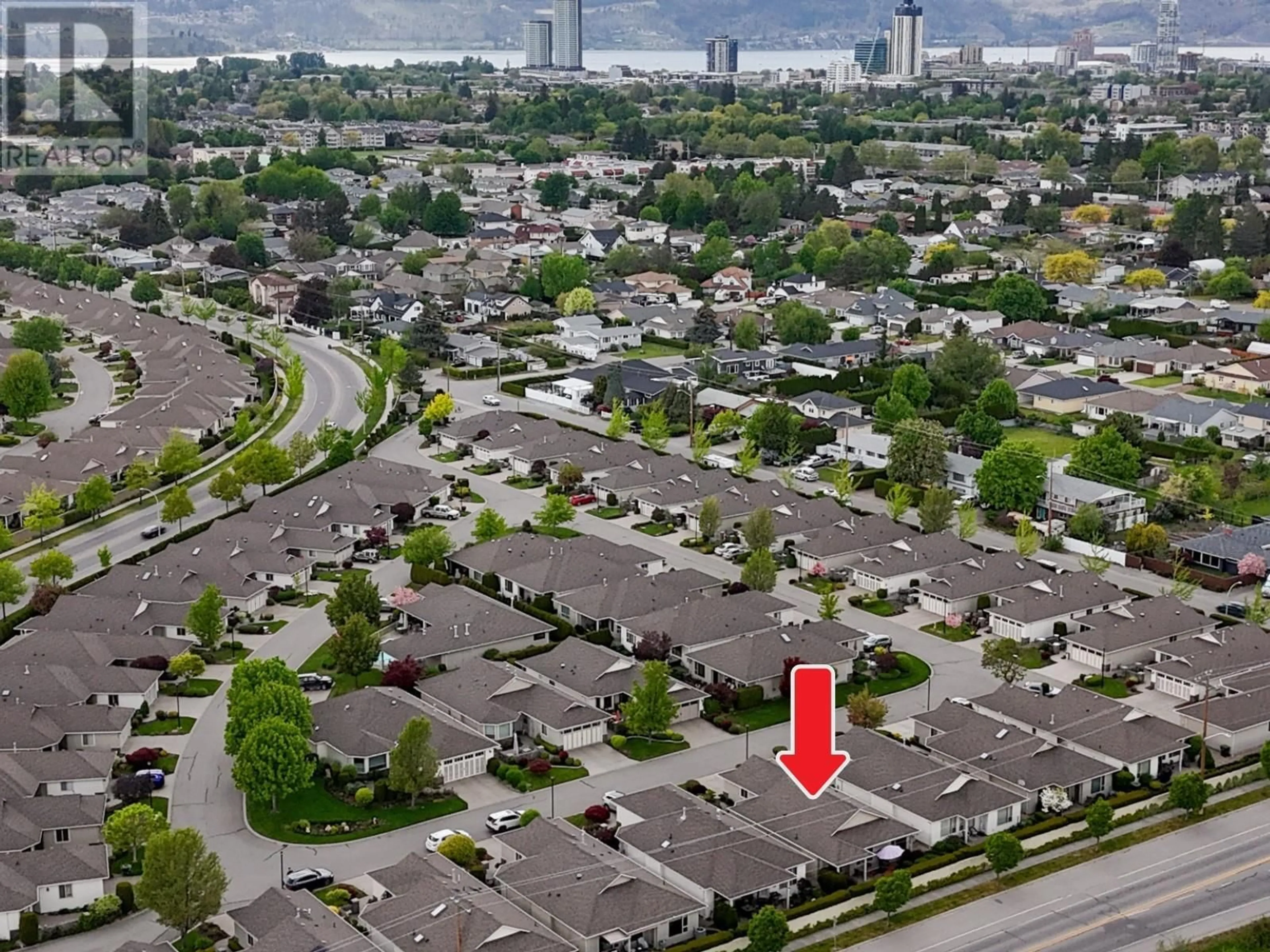 A pic from outside/outdoor area/front of a property/back of a property/a pic from drone, street for 137 - 1405 GUISACHAN PLACE, Kelowna British Columbia V1Y9X8