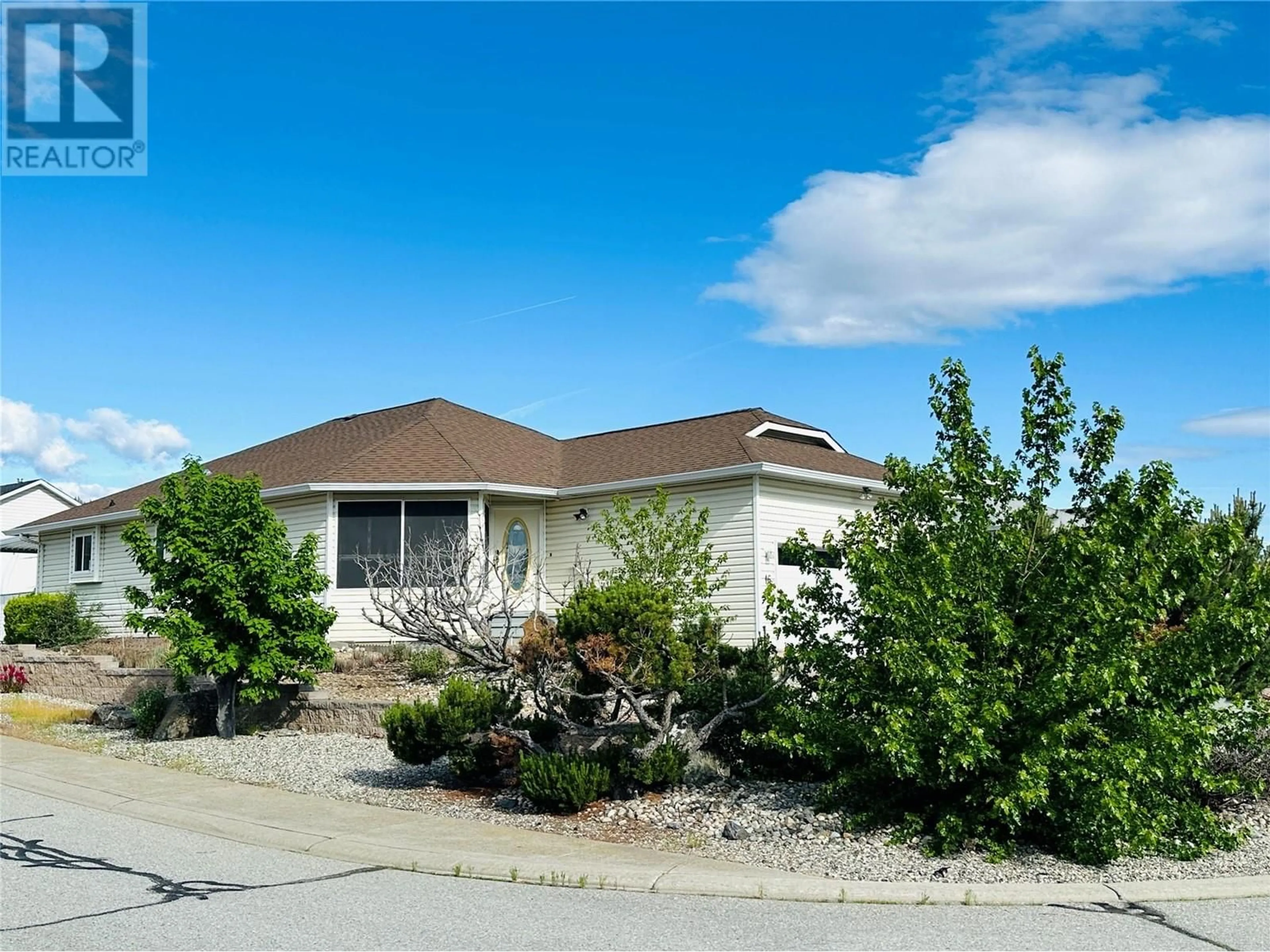 Home with vinyl exterior material, street for 16 KILLDEER PLACE, Osoyoos British Columbia V0H1V5