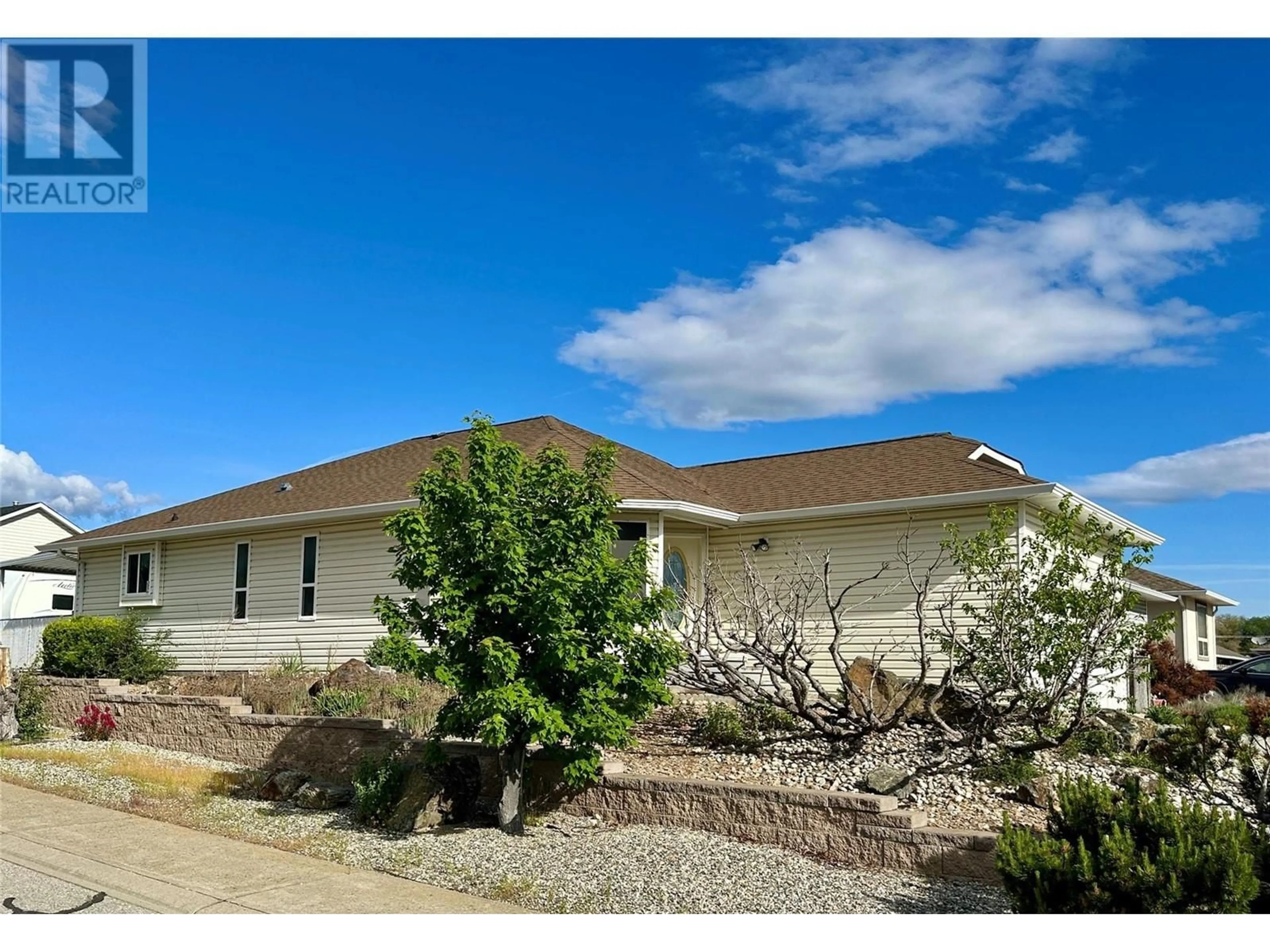 Home with vinyl exterior material, street for 16 KILLDEER PLACE, Osoyoos British Columbia V0H1V5