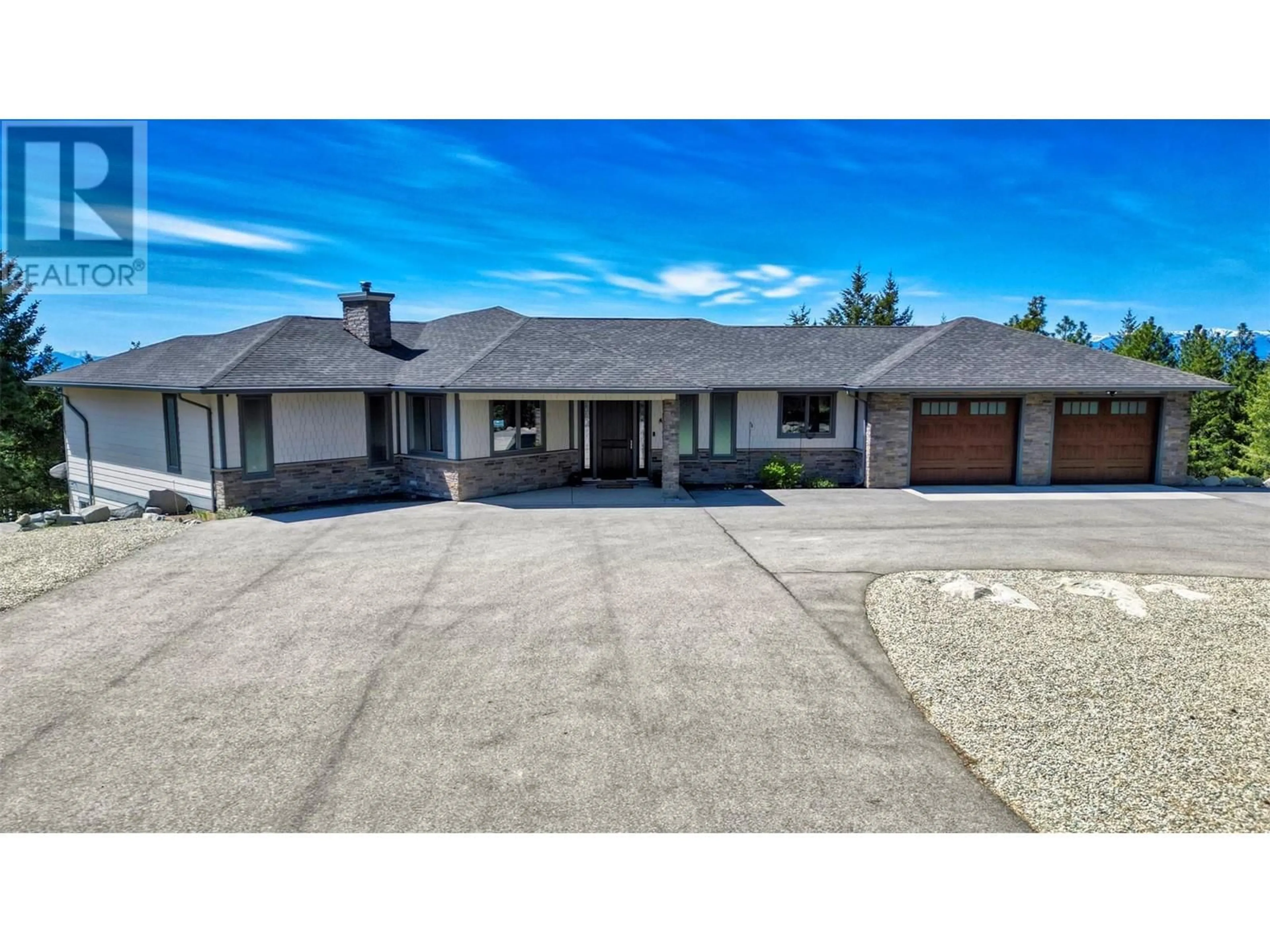 A pic from outside/outdoor area/front of a property/back of a property/a pic from drone, street for 148 SASQUATCH TRAIL, Osoyoos British Columbia V0H1V6