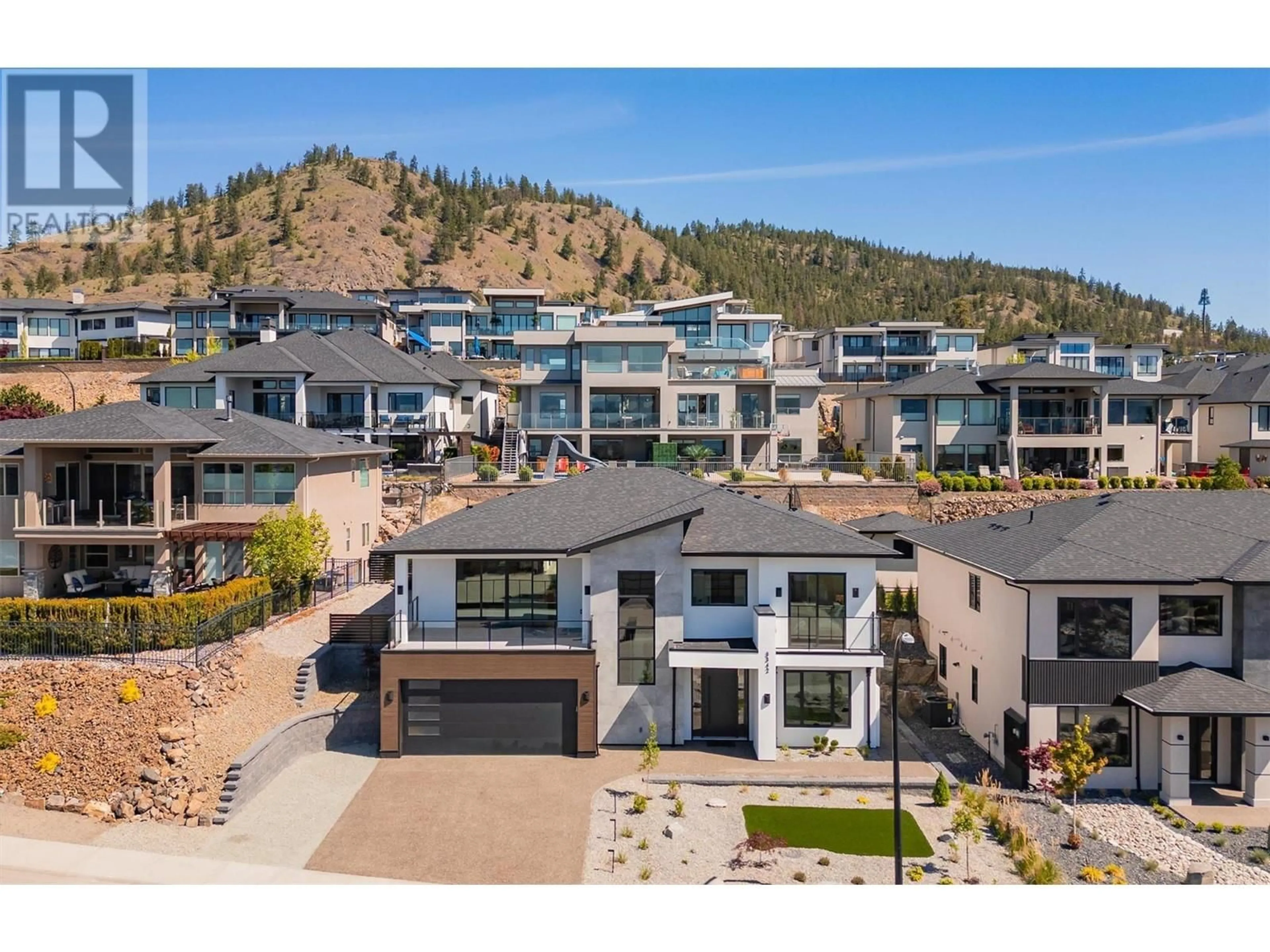 A pic from outside/outdoor area/front of a property/back of a property/a pic from drone, mountain view for 3342 VINEYARD VIEW DRIVE, West Kelowna British Columbia V4T3B4