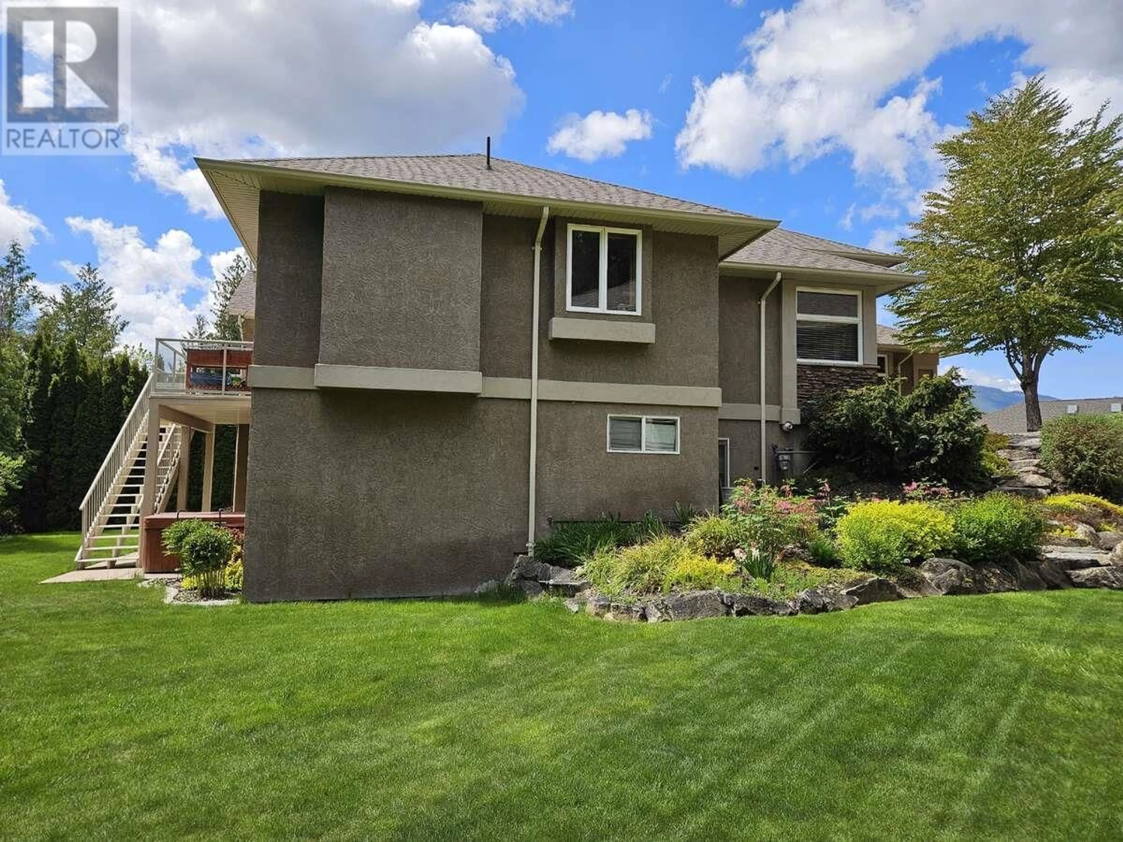 Home with vinyl exterior material, street for 2470 24 AVENUE NORTHEAST, Salmon Arm British Columbia V1E3Y4