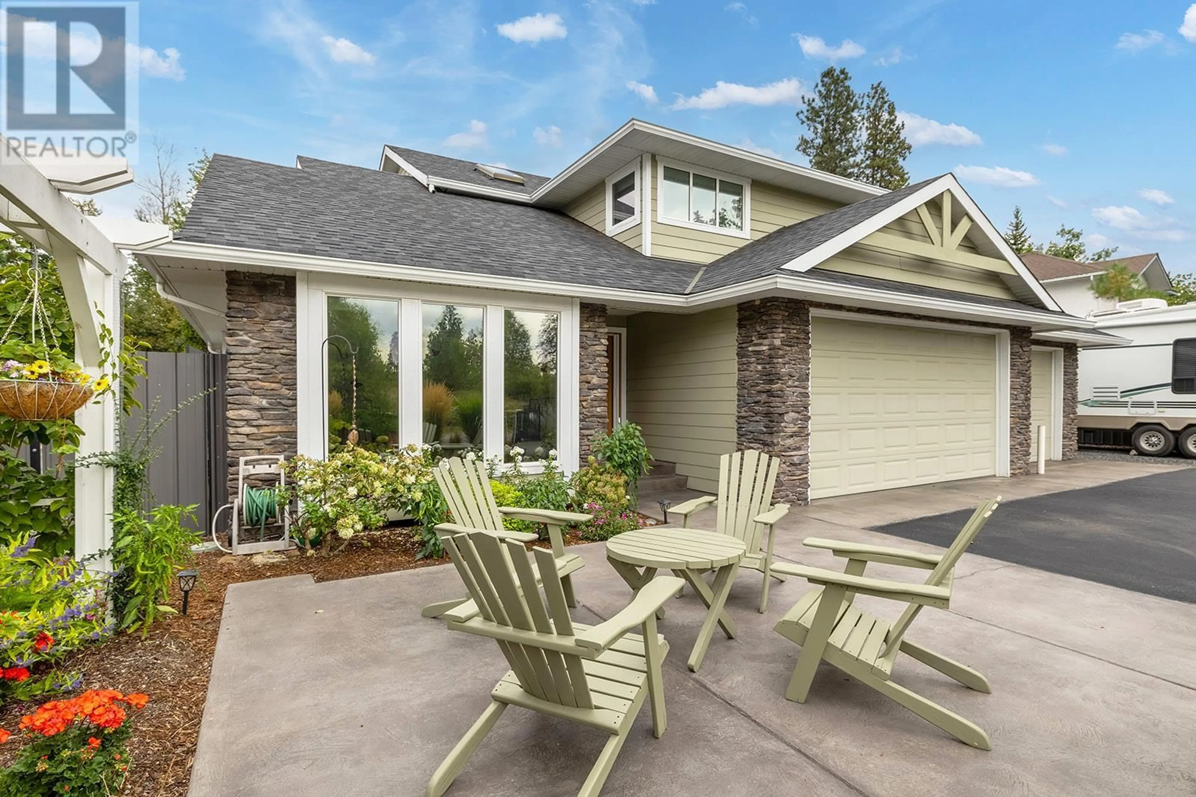 Home with vinyl exterior material, street for 3135 HALL ROAD, Kelowna British Columbia V1W2R7