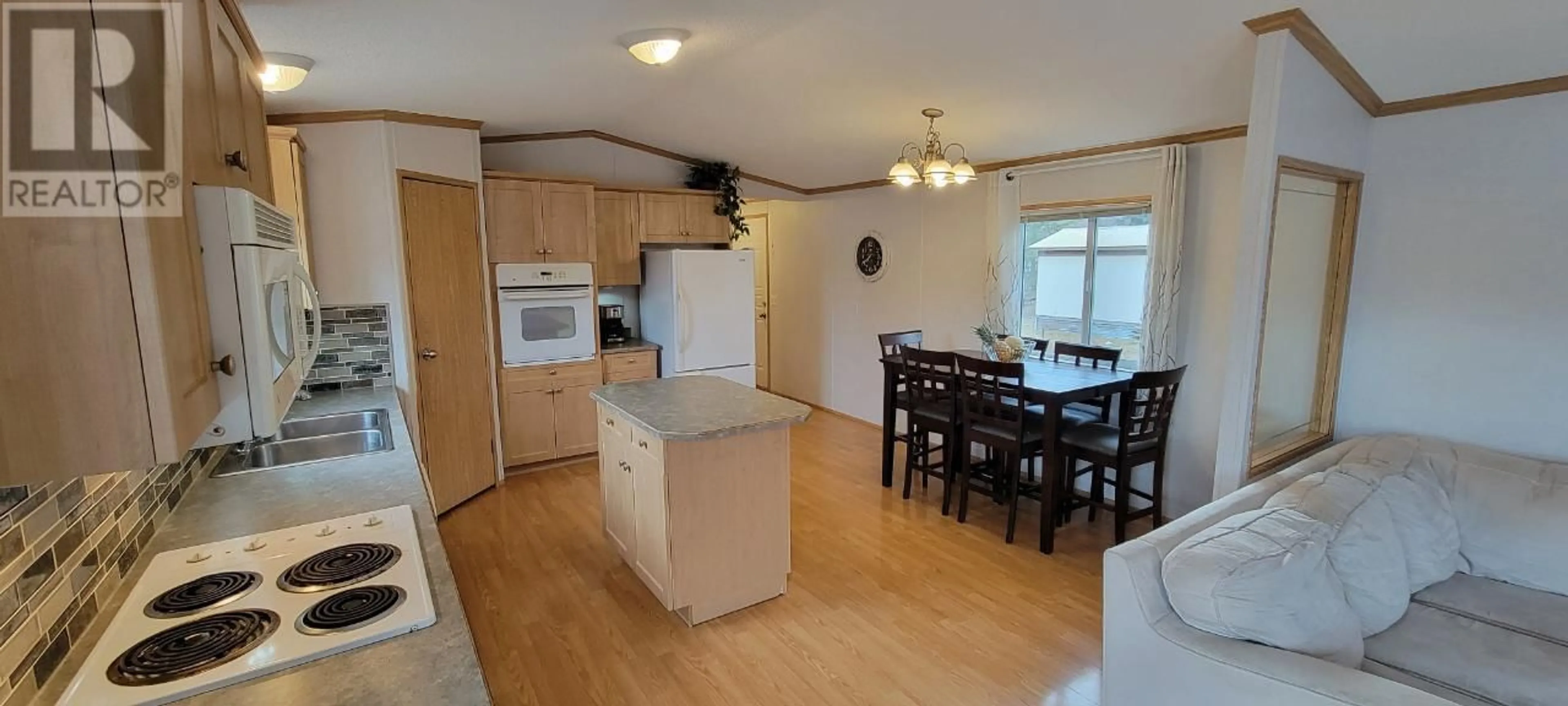 Standard kitchen, wood/laminate floor for 3216 BIRCH ISLAND LOST CRK ROAD, Clearwater British Columbia V0E3A0
