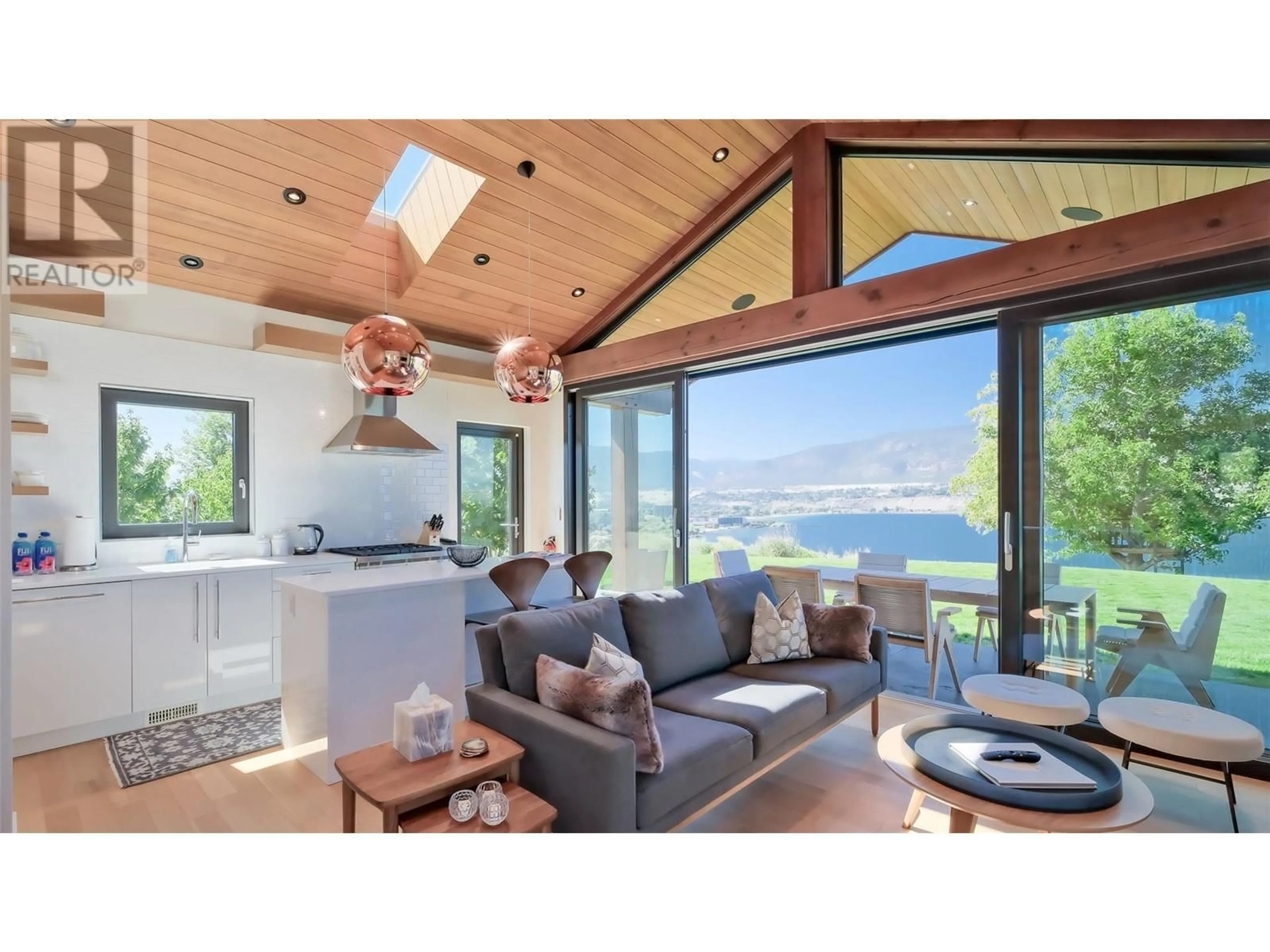 Living room with furniture, wood/laminate floor for 331 LOWER BENCH ROAD, Penticton British Columbia V2A8V4