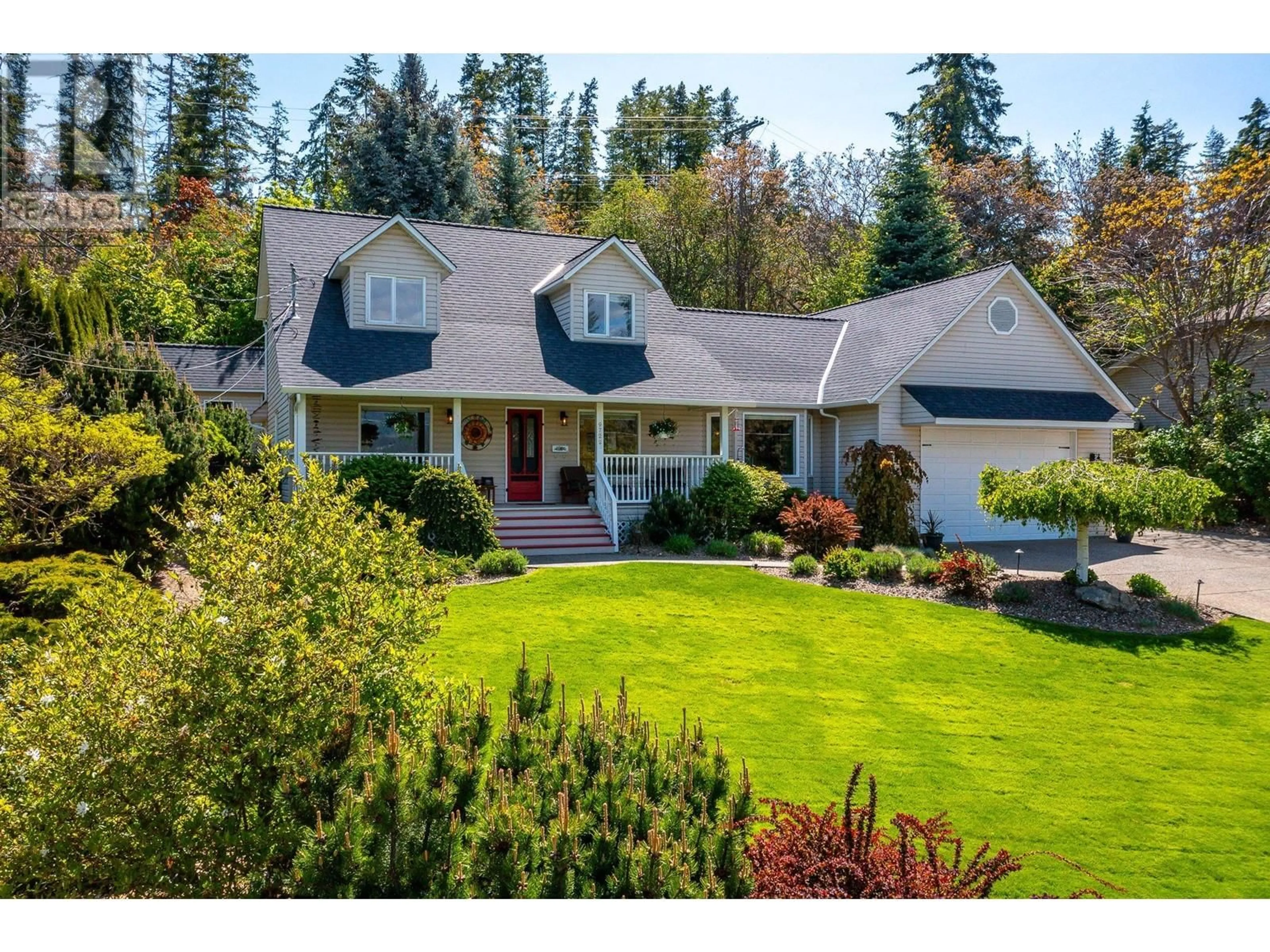 Home with vinyl exterior material, street for 9722 CAMERON ROAD, Vernon British Columbia V1H1K9