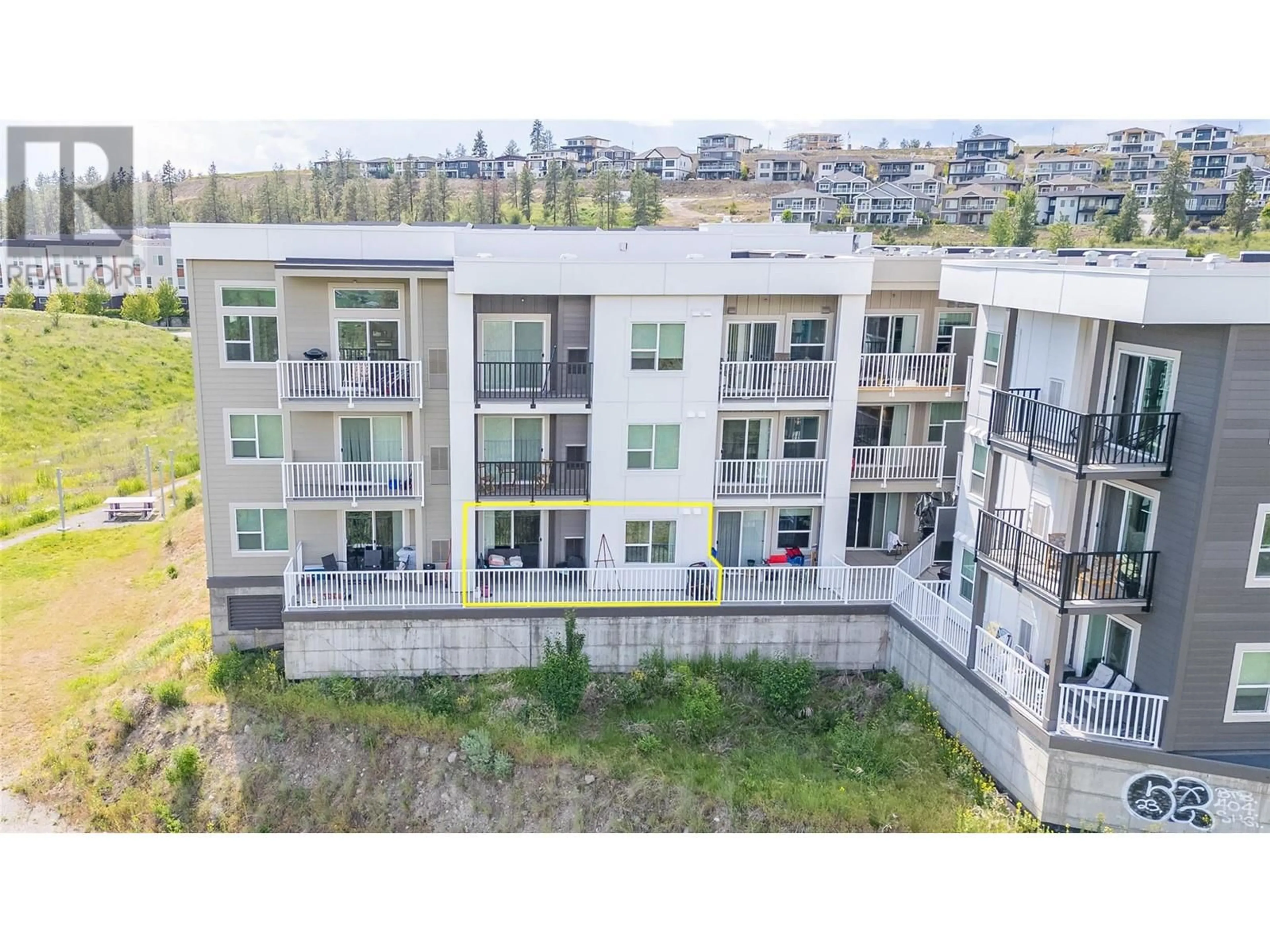 A pic from outside/outdoor area/front of a property/back of a property/a pic from drone, unknown for 130 - 625 ACADEMY WAY, Kelowna British Columbia V1V0E3