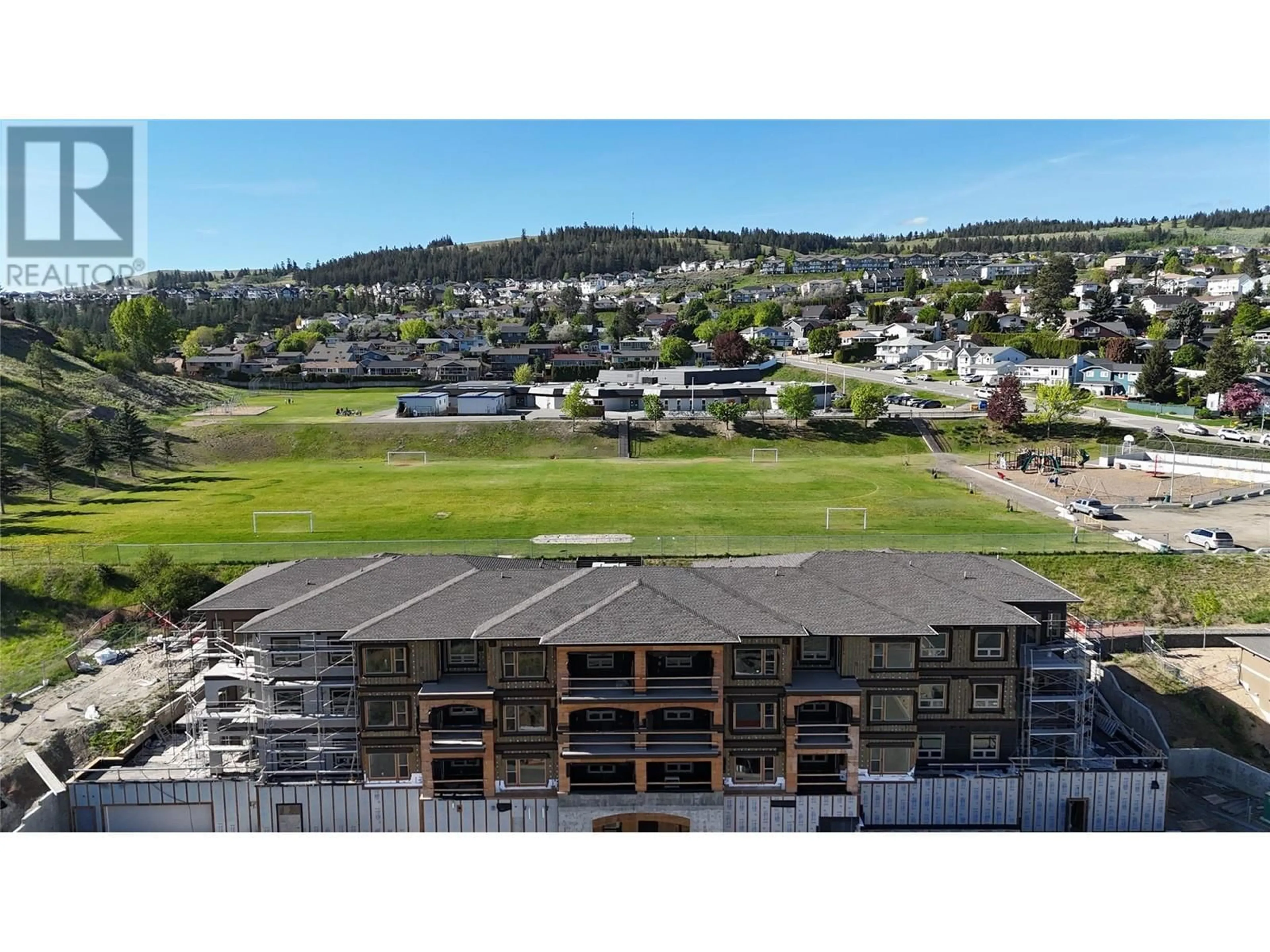 A pic from outside/outdoor area/front of a property/back of a property/a pic from drone, mountain view for 102 - 2171 VAN HORNE DRIVE, Kamloops British Columbia V1S0E2