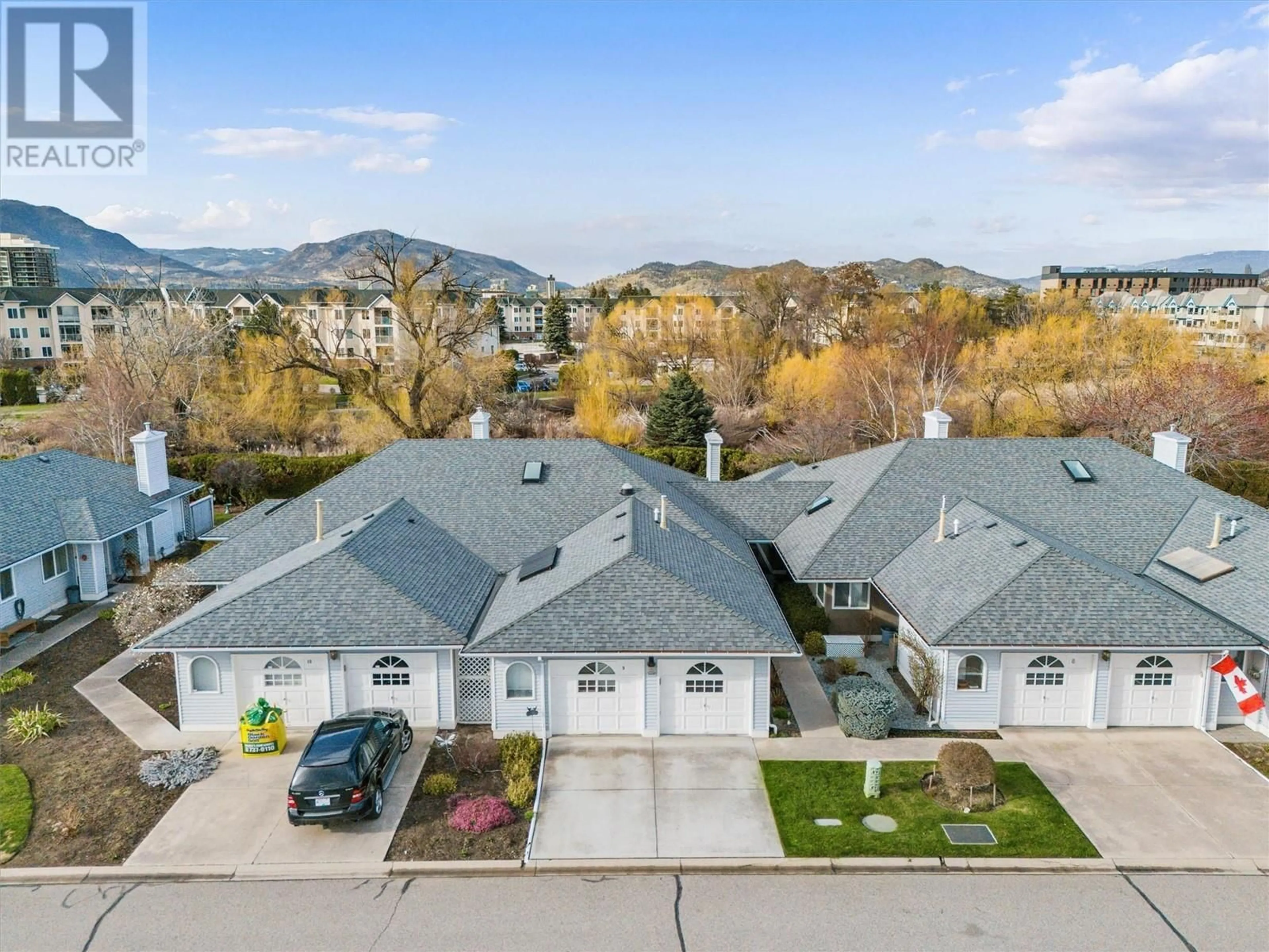 A pic from outside/outdoor area/front of a property/back of a property/a pic from drone, mountain view for 9 - 3370 CASORSO ROAD, Kelowna British Columbia V1W3J2