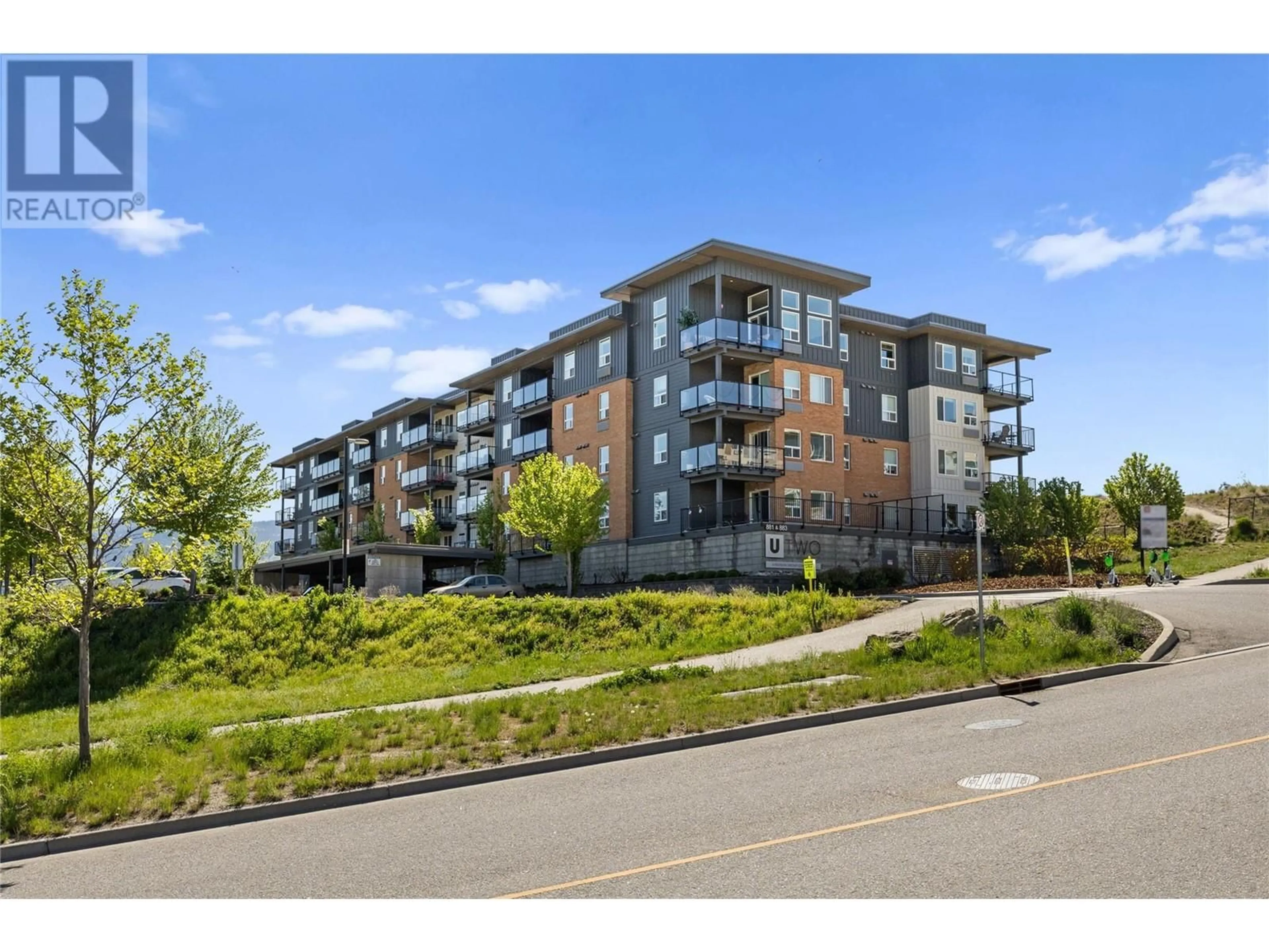 A pic from outside/outdoor area/front of a property/back of a property/a pic from drone, unknown for PH6 - 881 ACADEMY WAY, Kelowna British Columbia V1V0A2