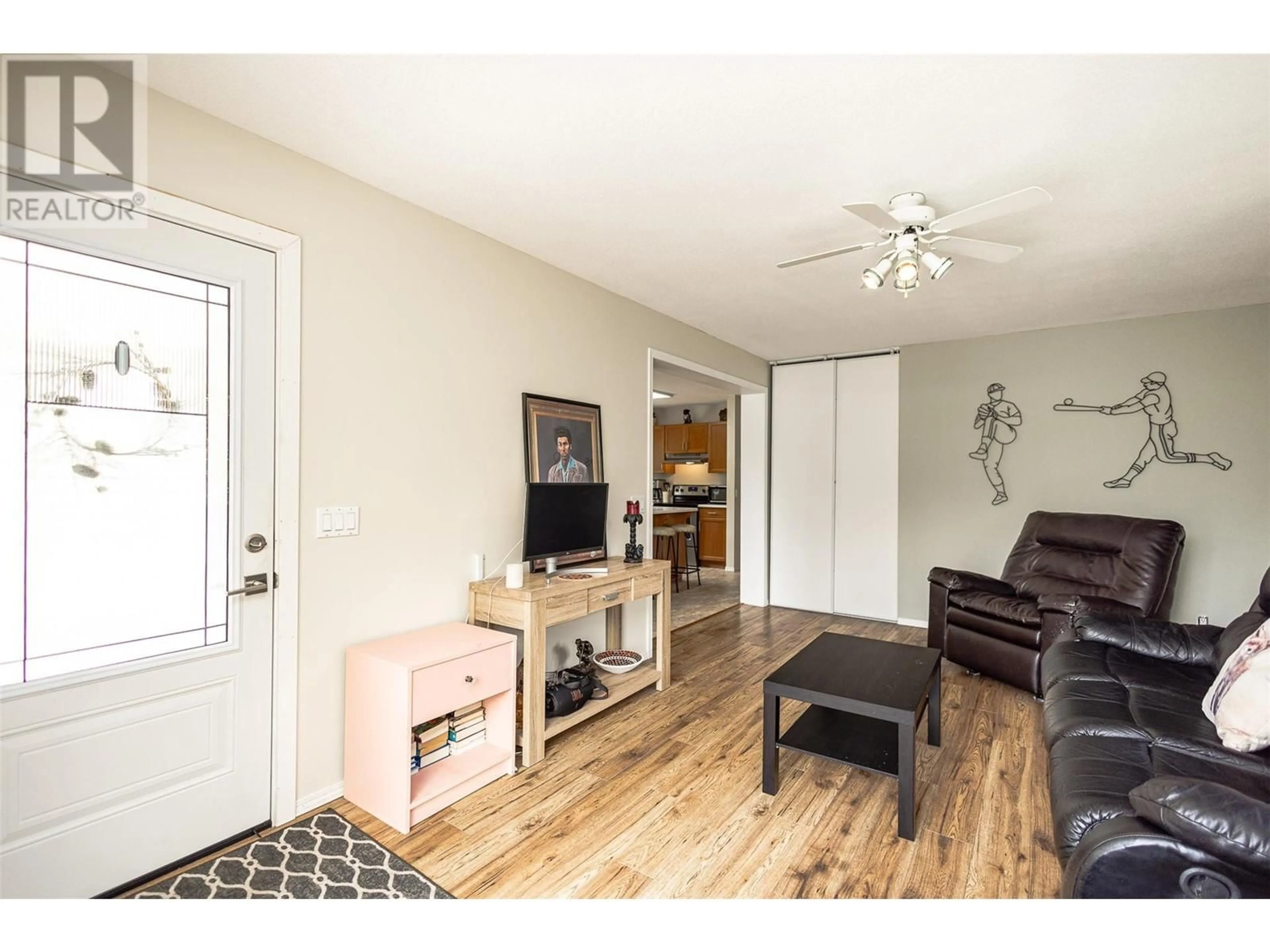 Living room with furniture, wood/laminate floor for 30 - 3585 ELK ROAD, West Kelowna British Columbia V4T1R5