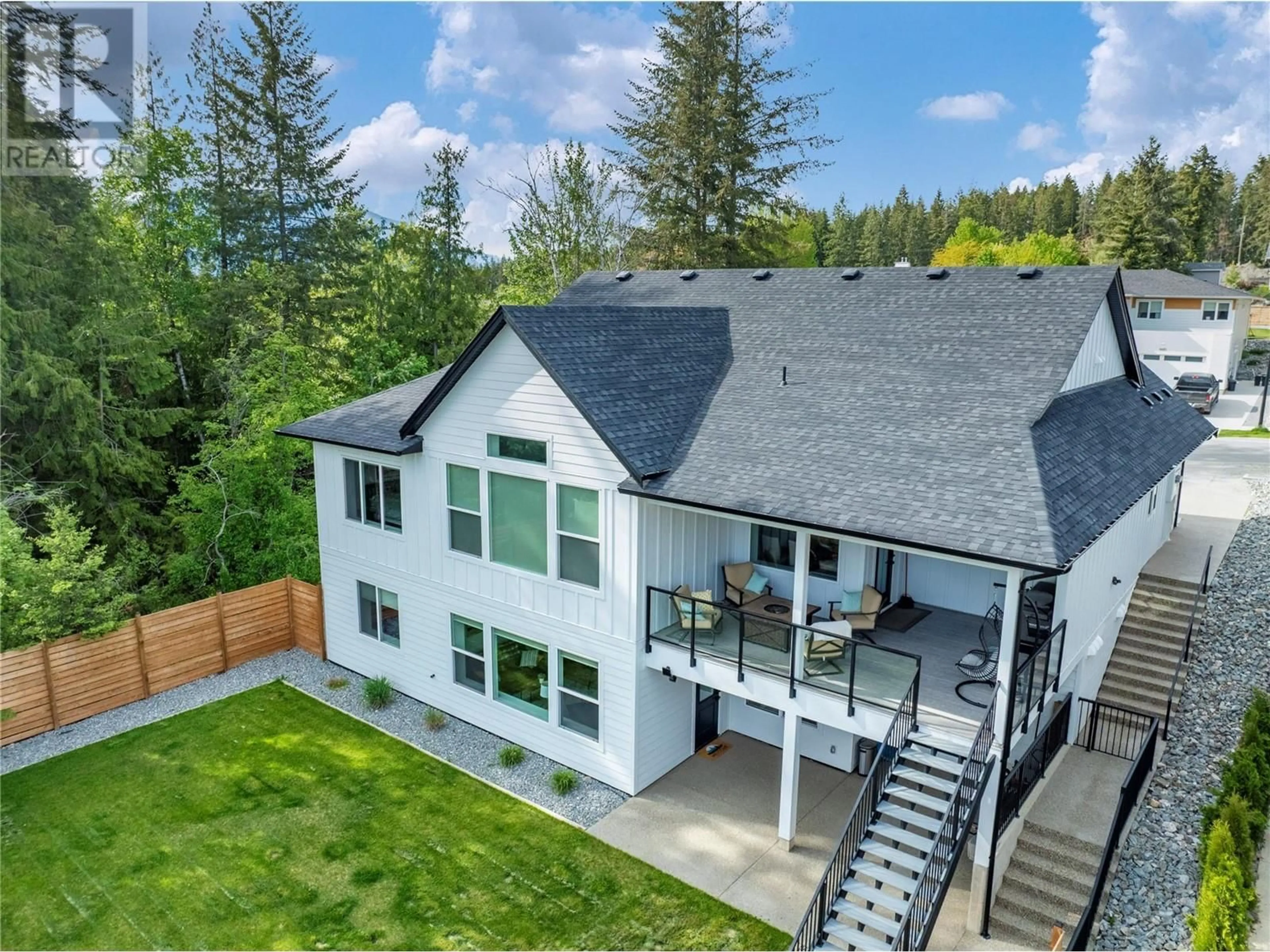 A pic from outside/outdoor area/front of a property/back of a property/a pic from drone, mountain view for 3450 18 AVENUE NORTHEAST, Salmon Arm British Columbia V1E1M9