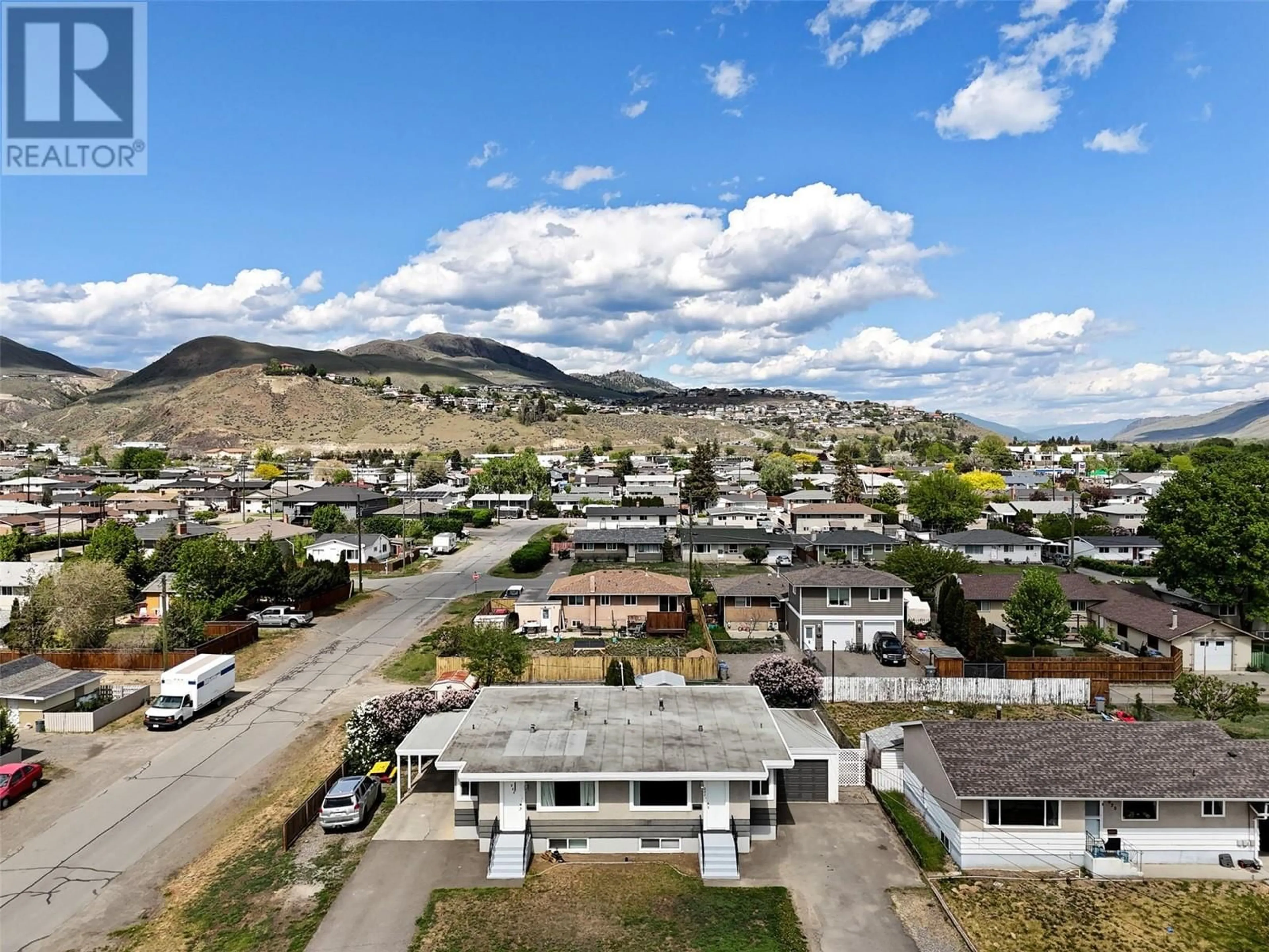 A pic from outside/outdoor area/front of a property/back of a property/a pic from drone, mountain view for 882 SELKIRK AVENUE, Kamloops British Columbia V2B1T9