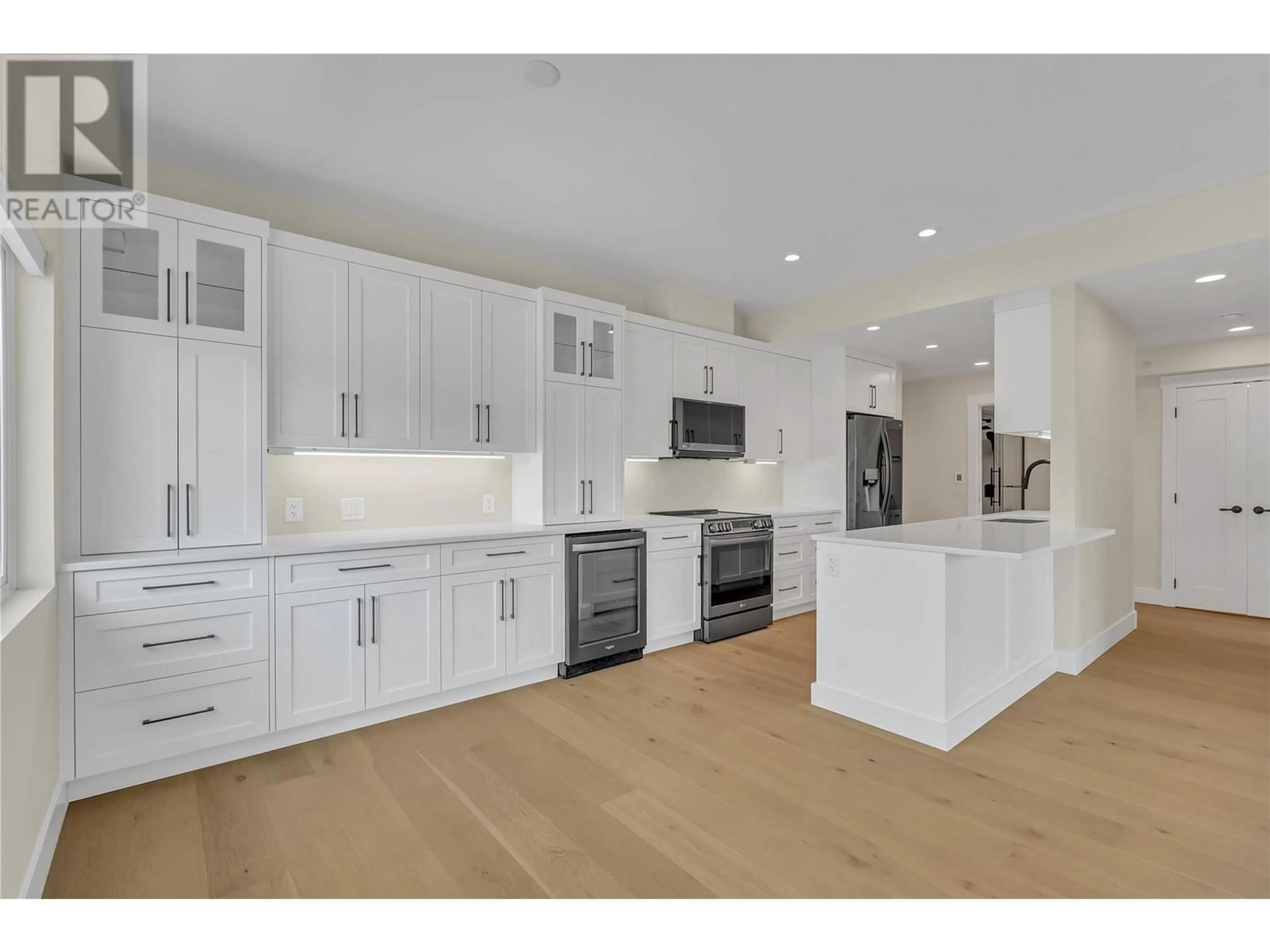 Open concept kitchen, unknown for 301 - 217 ELM AVENUE, Penticton British Columbia V2A3W1