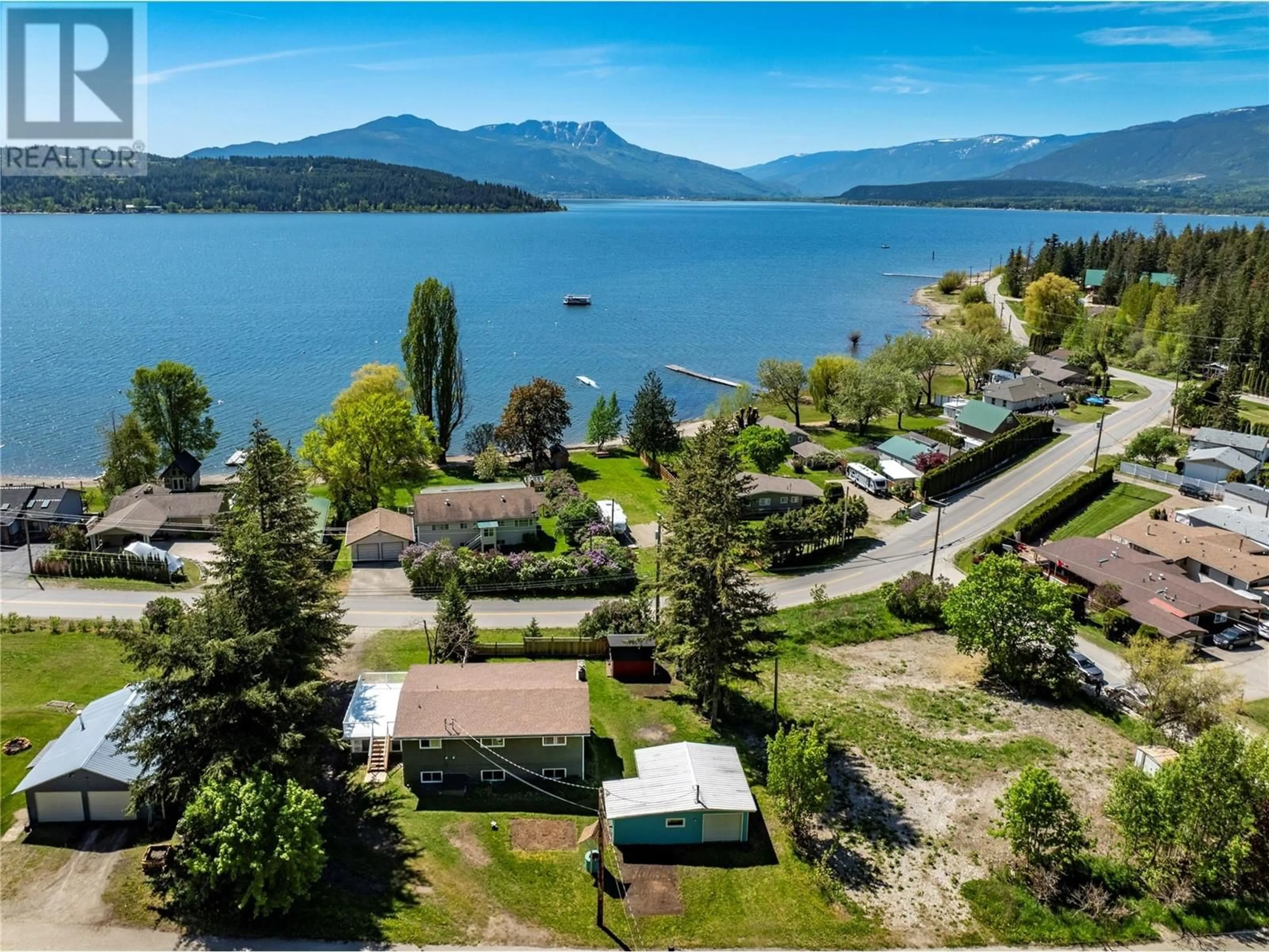 A pic from outside/outdoor area/front of a property/back of a property/a pic from drone, water/lake/river/ocean view for 3985 SUNNYBRAE-CANOE POINT ROAD, Tappen British Columbia V0E2X1
