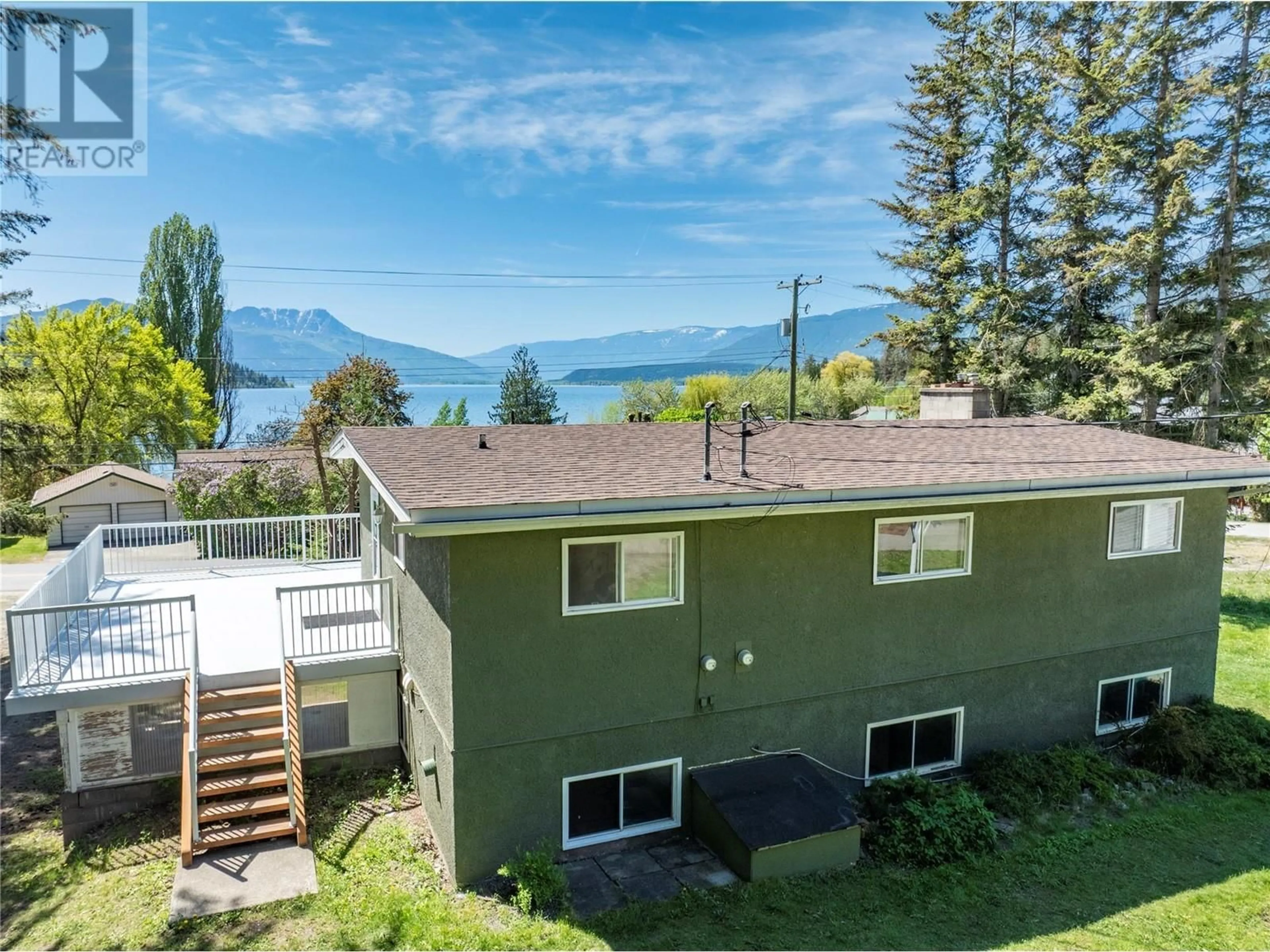 A pic from outside/outdoor area/front of a property/back of a property/a pic from drone, water/lake/river/ocean view for 3985 SUNNYBRAE-CANOE POINT ROAD, Tappen British Columbia V0E2X1