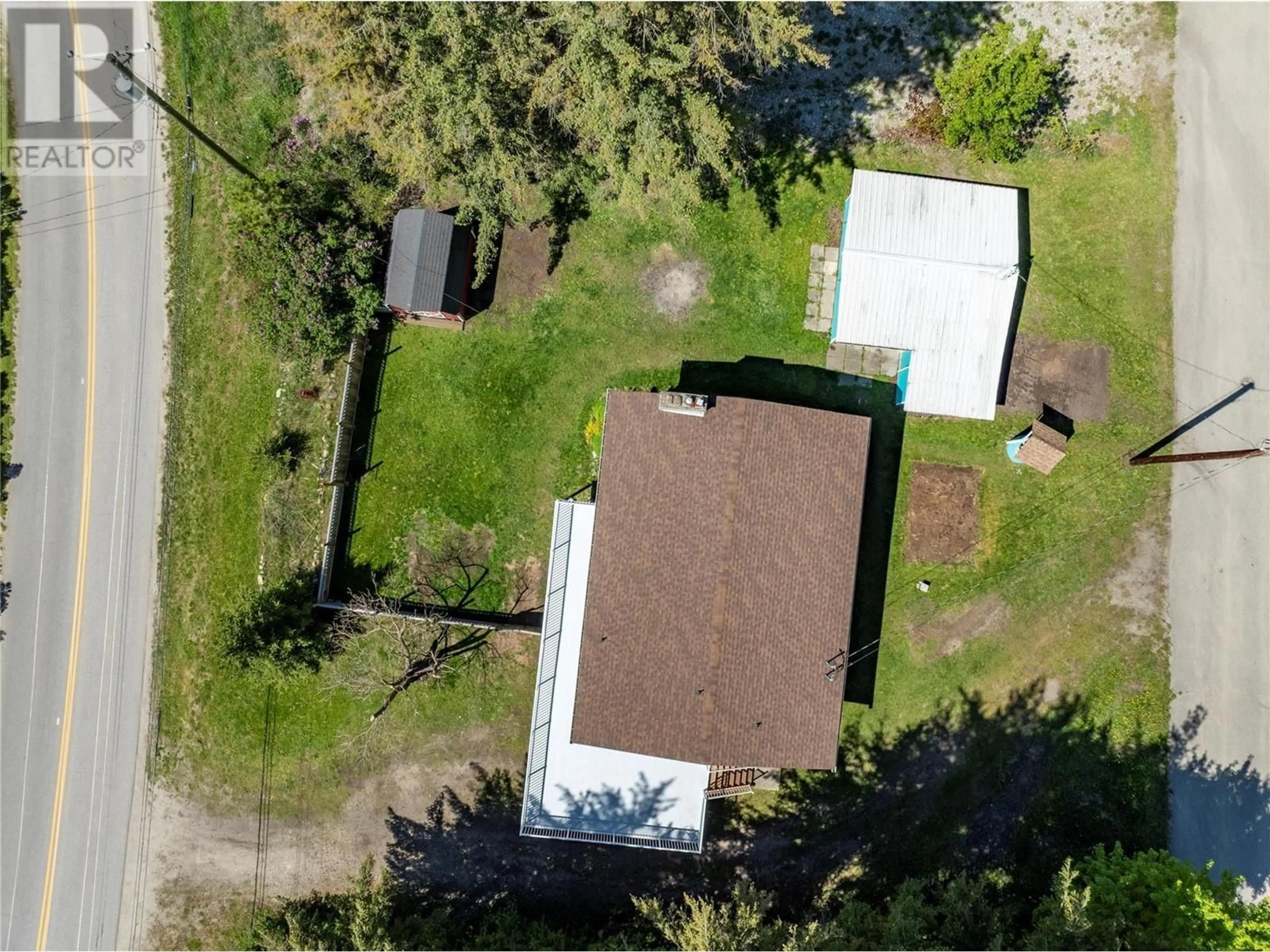 A pic from outside/outdoor area/front of a property/back of a property/a pic from drone, street for 3985 SUNNYBRAE-CANOE POINT ROAD, Tappen British Columbia V0E2X1