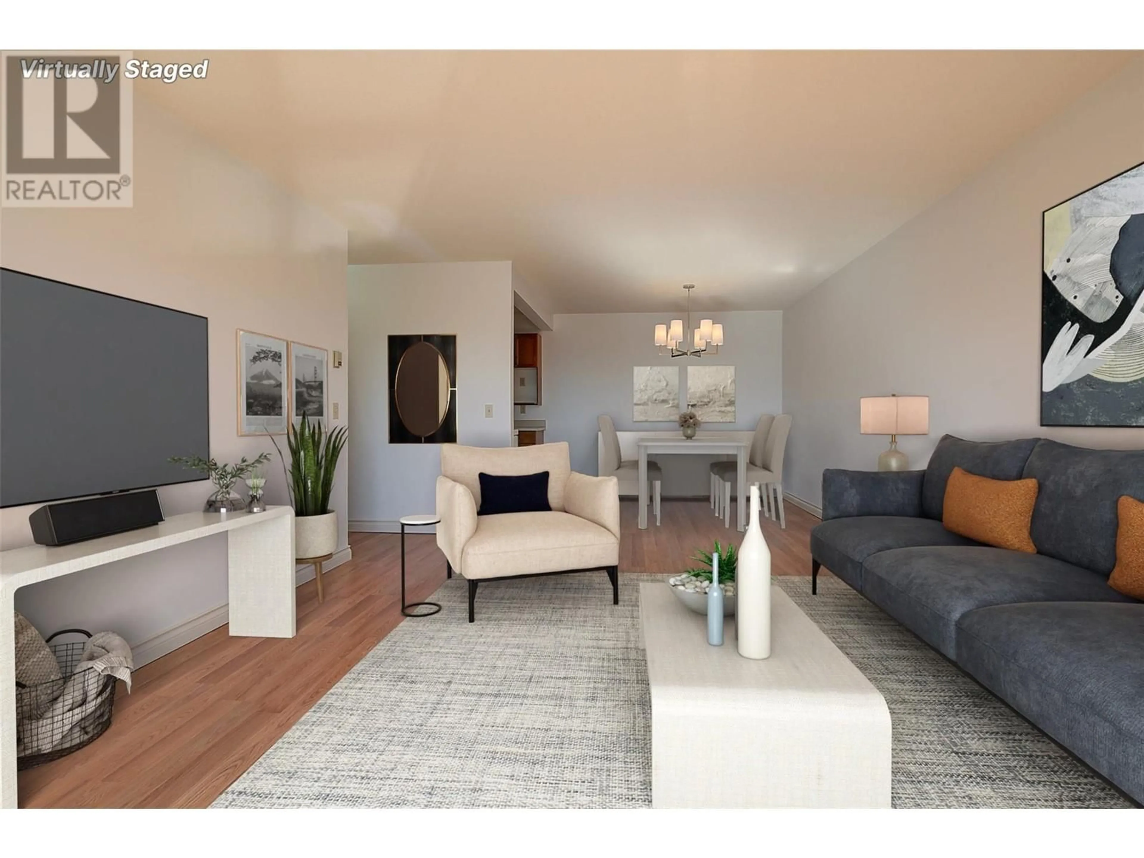 Living room with furniture, wood/laminate floor for 205 - 3815 BROWN ROAD, West Kelowna British Columbia V4T1R8