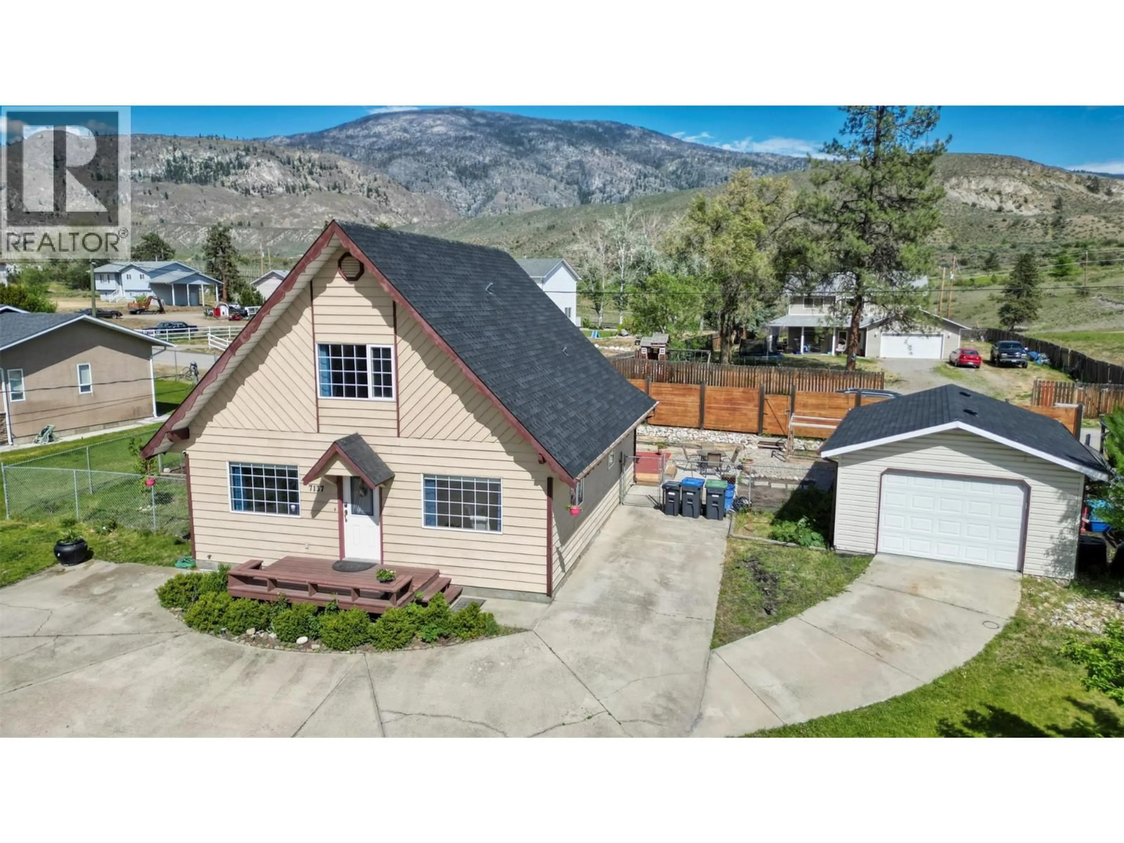 A pic from outside/outdoor area/front of a property/back of a property/a pic from drone, mountain view for 7137 TUCELNUIT DRIVE, Oliver British Columbia V0H1T2