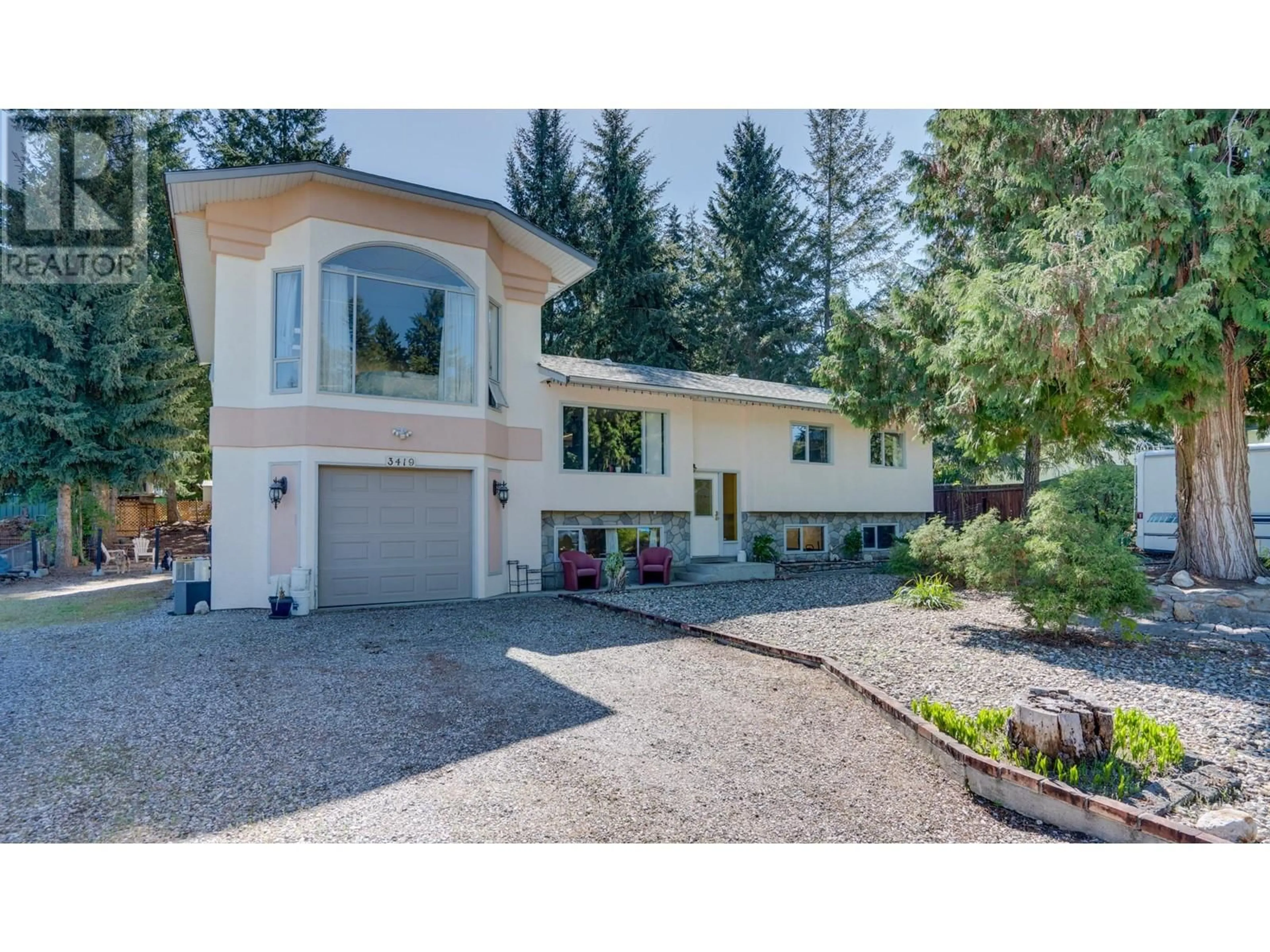 Home with vinyl exterior material, street for 3419 LARCH DRIVE, Armstrong British Columbia V0E1B8