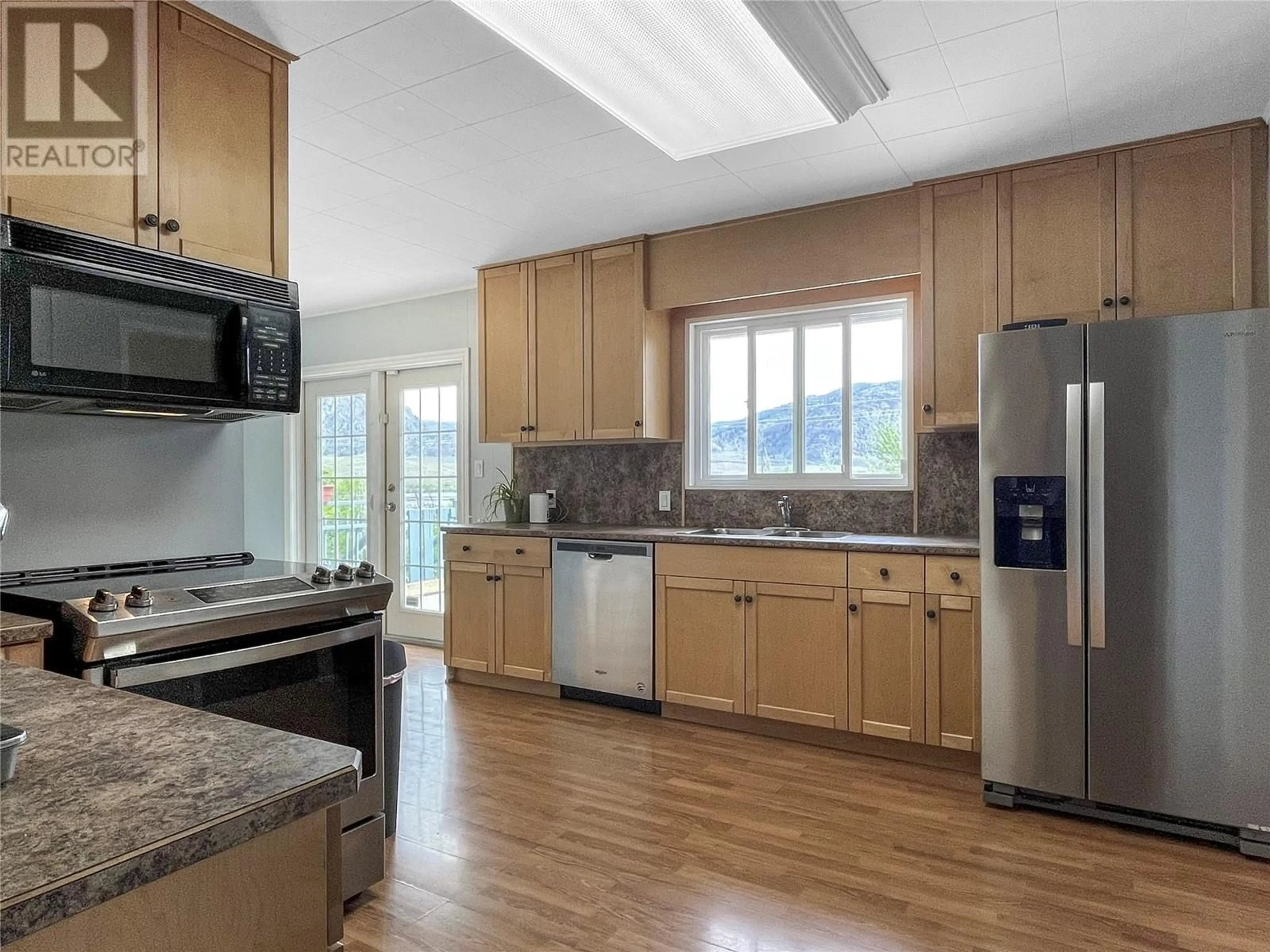 Open concept kitchen, unknown for 18606 HIGHWAY 97 OTHER, Osoyoos British Columbia V0H1V2