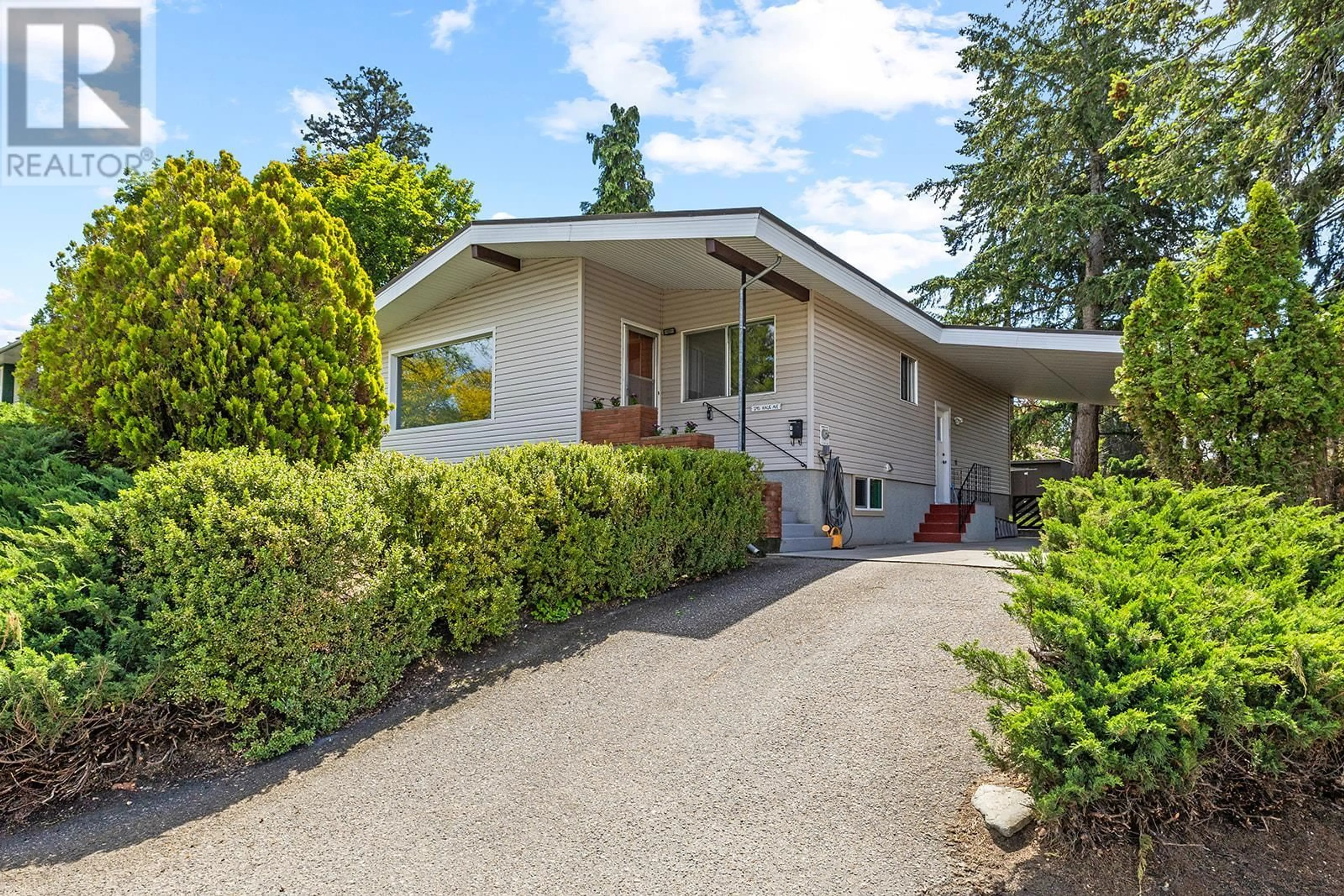 Home with vinyl exterior material, street for 1745 HAUG AVENUE, Kelowna British Columbia V1Y4M3