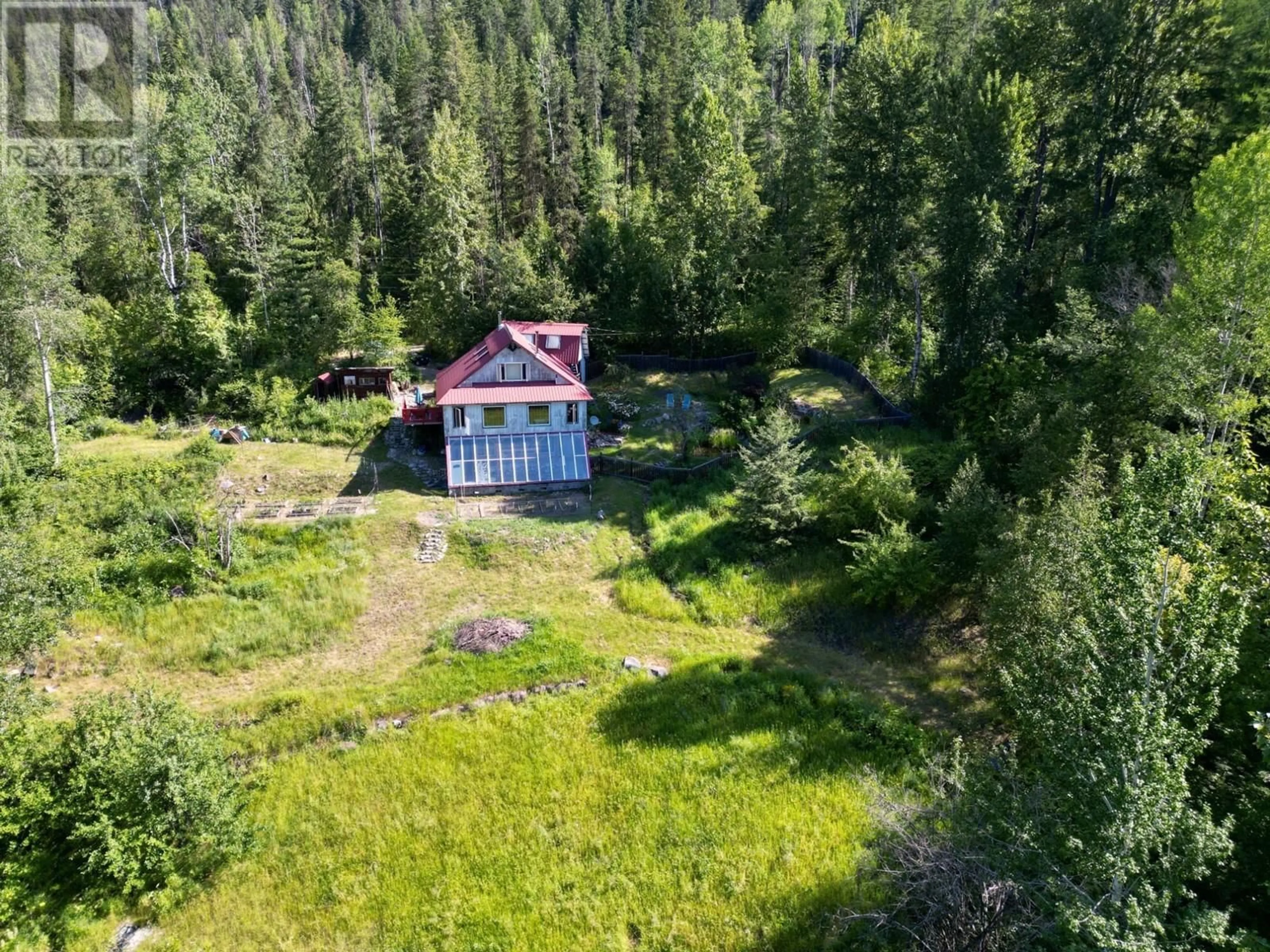A pic from outside/outdoor area/front of a property/back of a property/a pic from drone, forest/trees view for 395 BOVEN ROAD, Nelson British Columbia V1L6J1